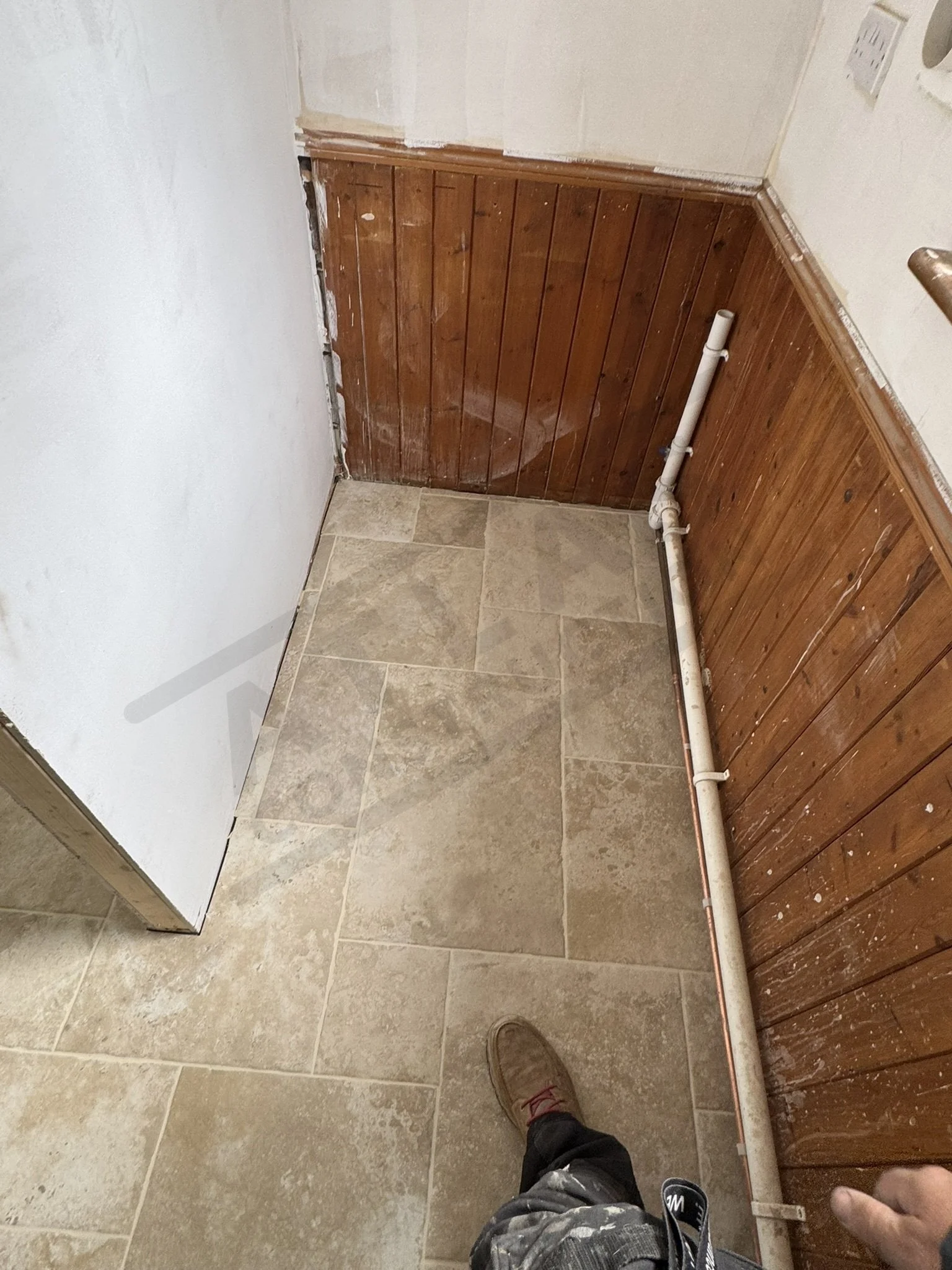Tiled floor ready for utility installation