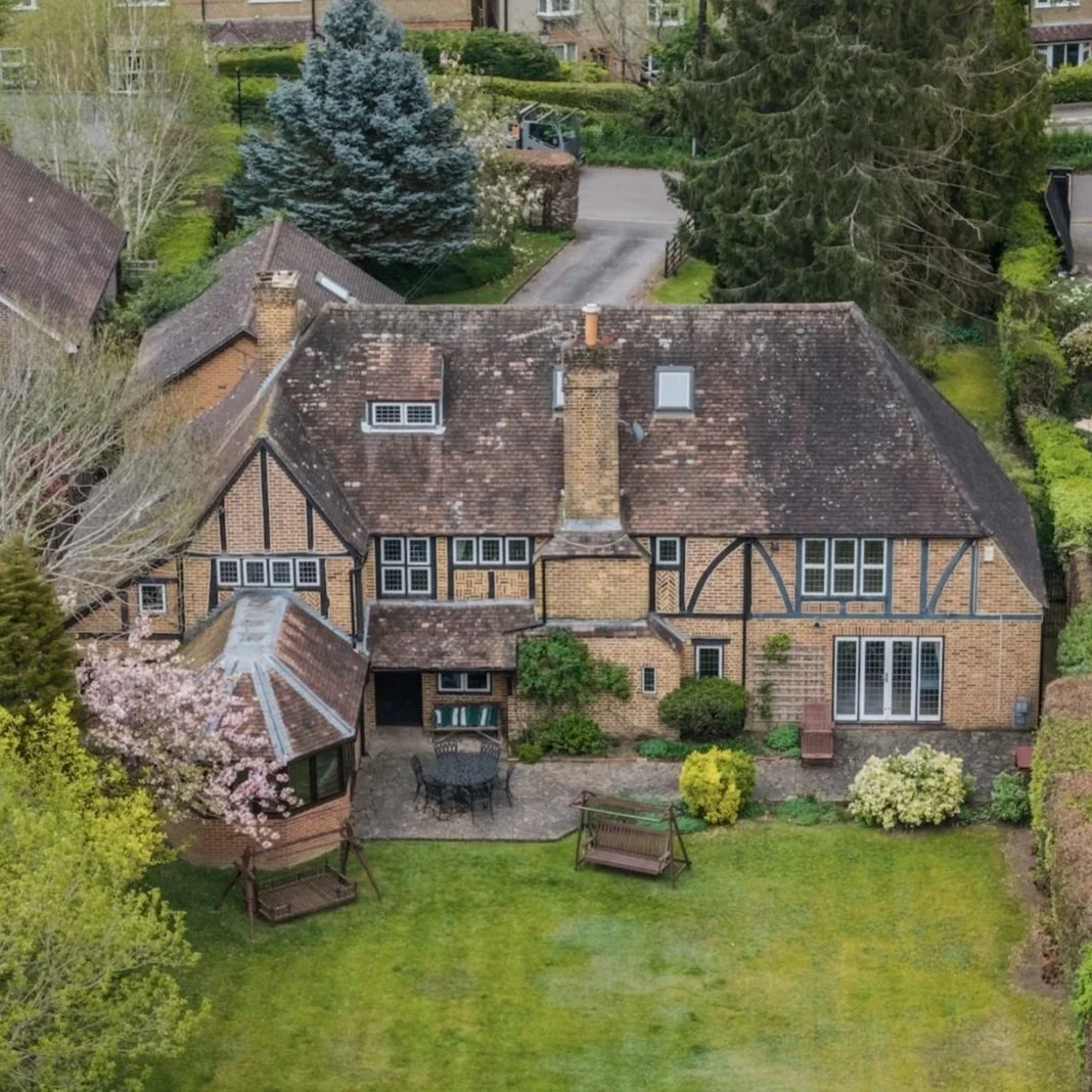 Aerial photo of tudor style house photographed with a drone
