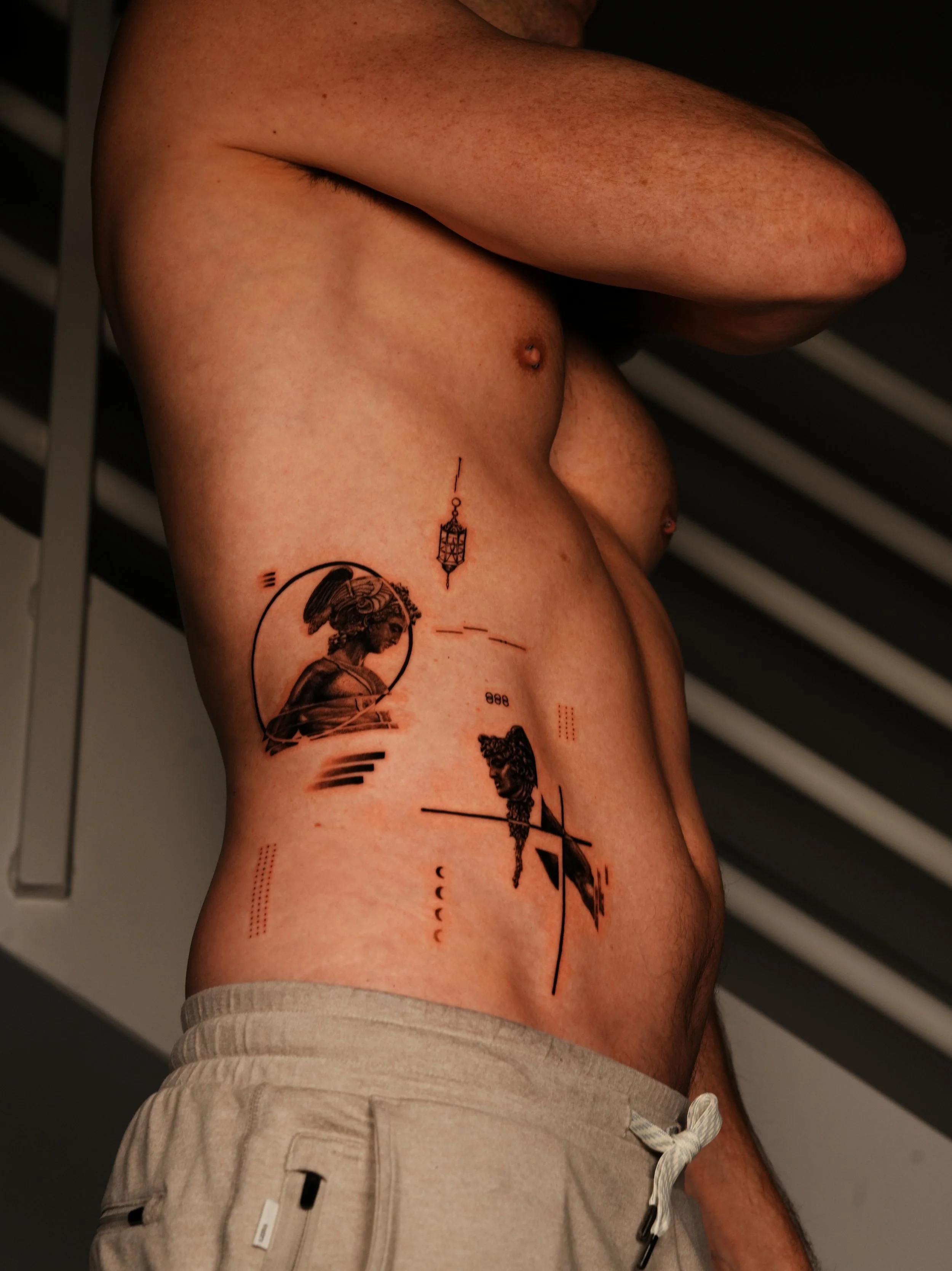 Perseus and Medusa Micro-Realism tattoo