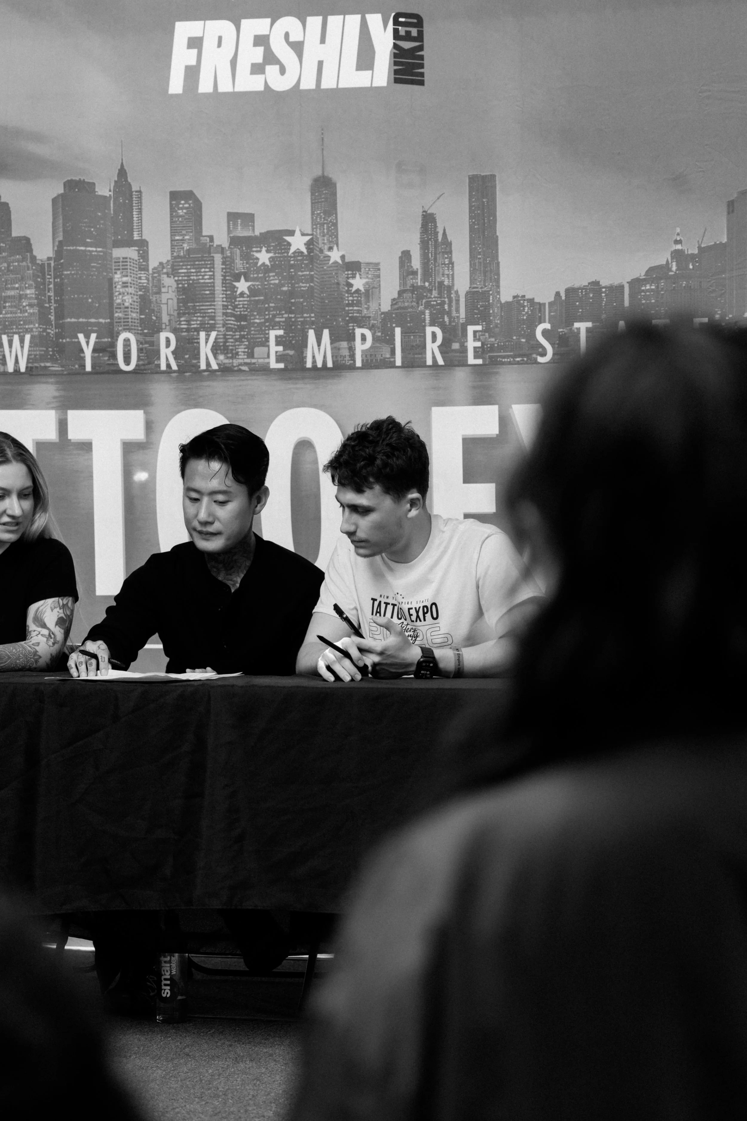 Gregory Mirzoyan judging NY Empire Tattoo Expo with tattooist ShiRyu