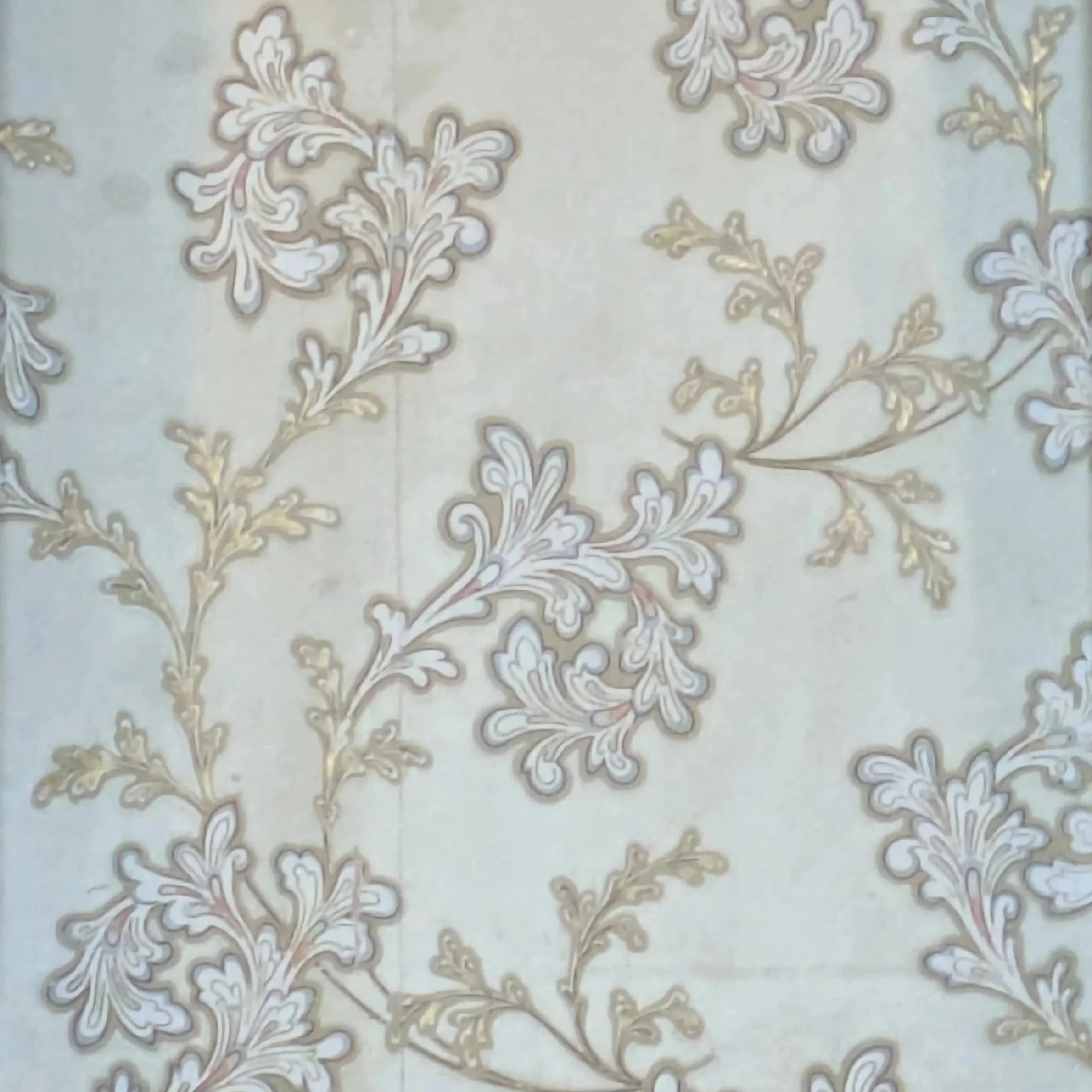 Cream colored floral wallpaper