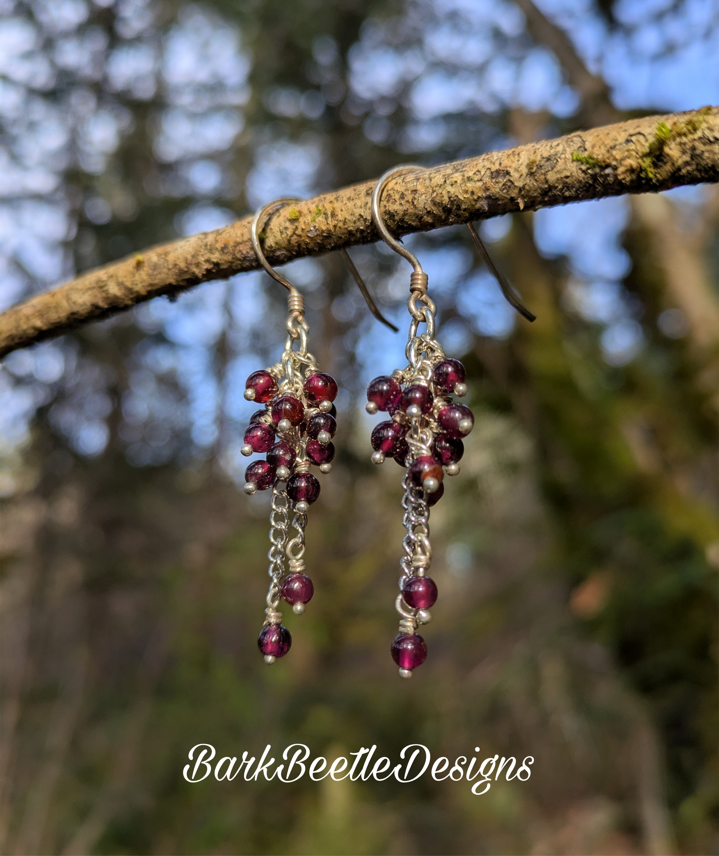 Grape garnet clustered dangling earrings.