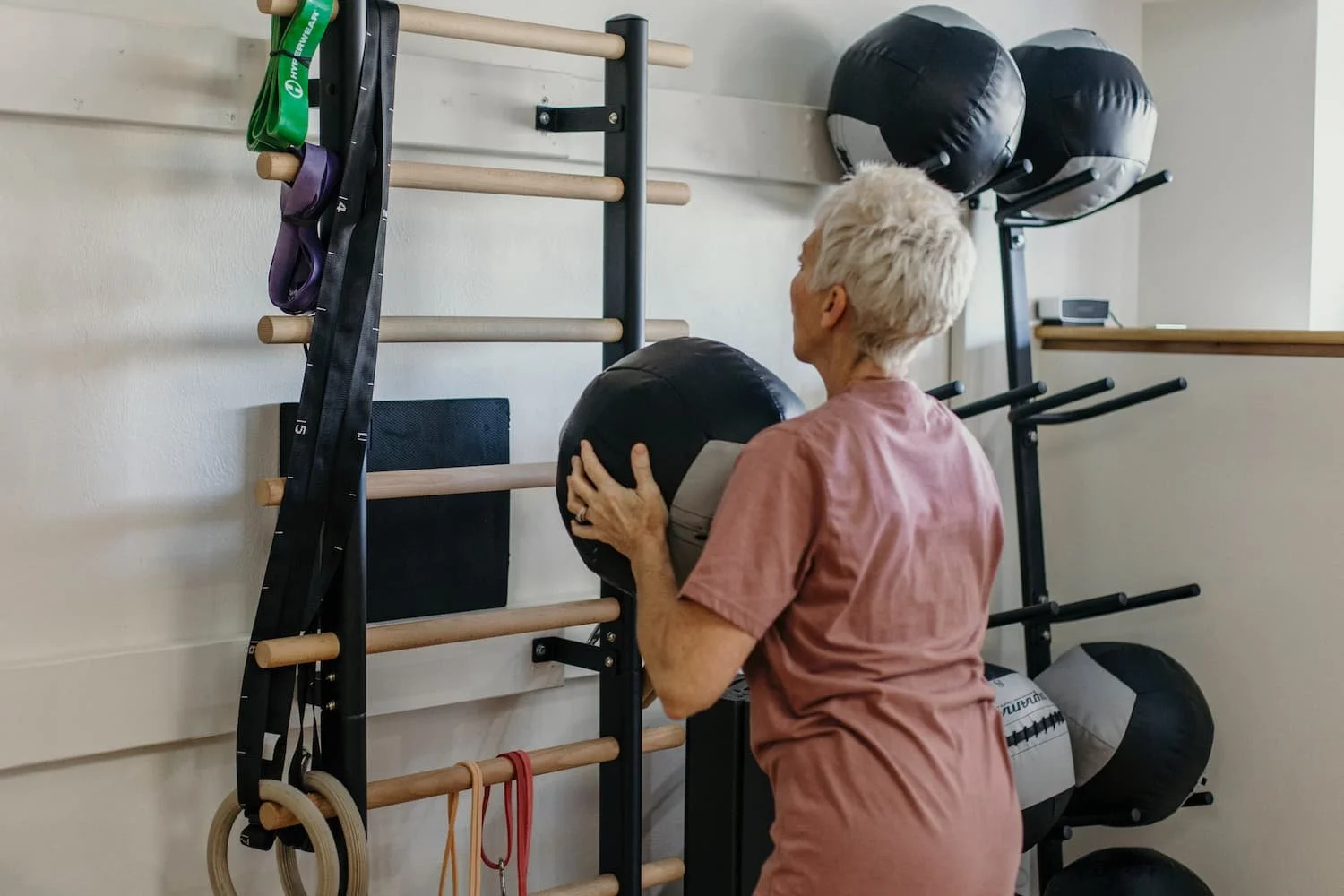 A woman over 60 performing a joint-friendly strength training exercise at A50 Personal Training in the South Hills