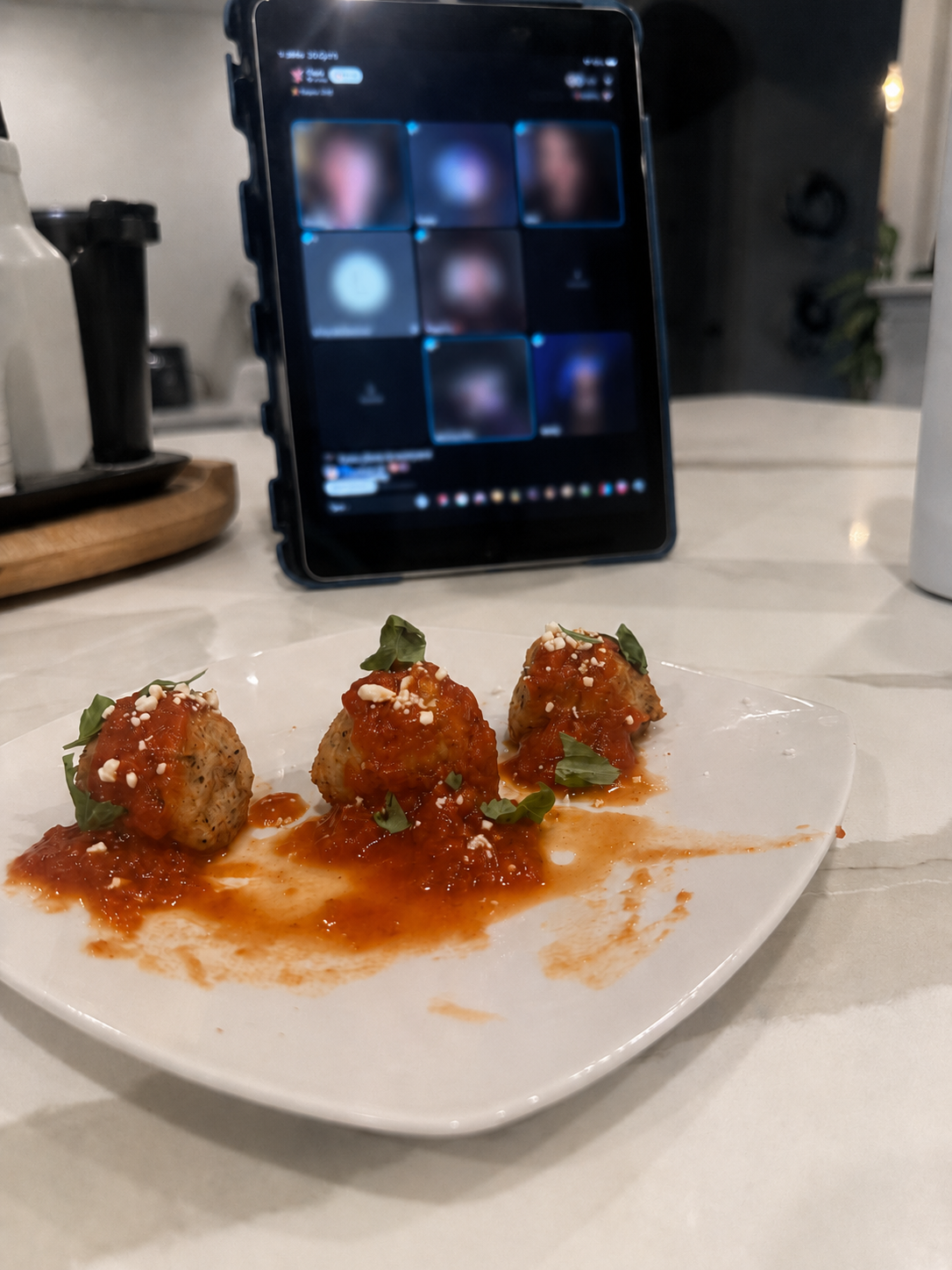 A portion right out of the freezer of three high-protein, cirrhosis-friendly Italian "sausage" meatballs served for dinner, featured on diagnosisofcirrhosis.com and cooked live on TikTok with friends by Angie from @diagnosis_cirrhosis.