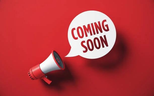 Red background with a megaphone and a speech bubble saying "Coming Soon".