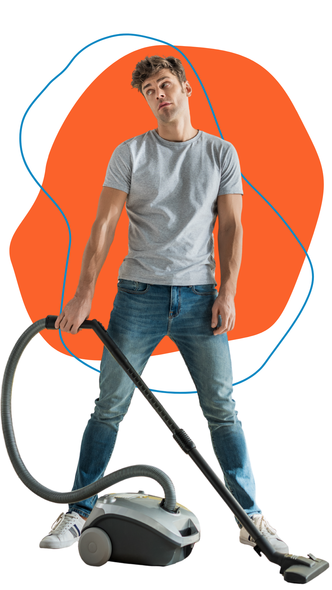 A young man in a gray t-shirt and blue jeans looks puzzled while vacuuming with a gray and black vacuum cleaner against a colorful abstract background.