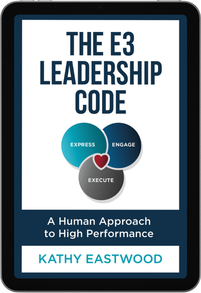 Book cover titled 'The E3 Leadership Code' by Kathy Eastwood, featuring a graphic of interconnected circles labeled 'Express', 'Engage', and 'Execute', with a heart symbol at the center, and the subtitle 'A Human Approach to High Performance'.