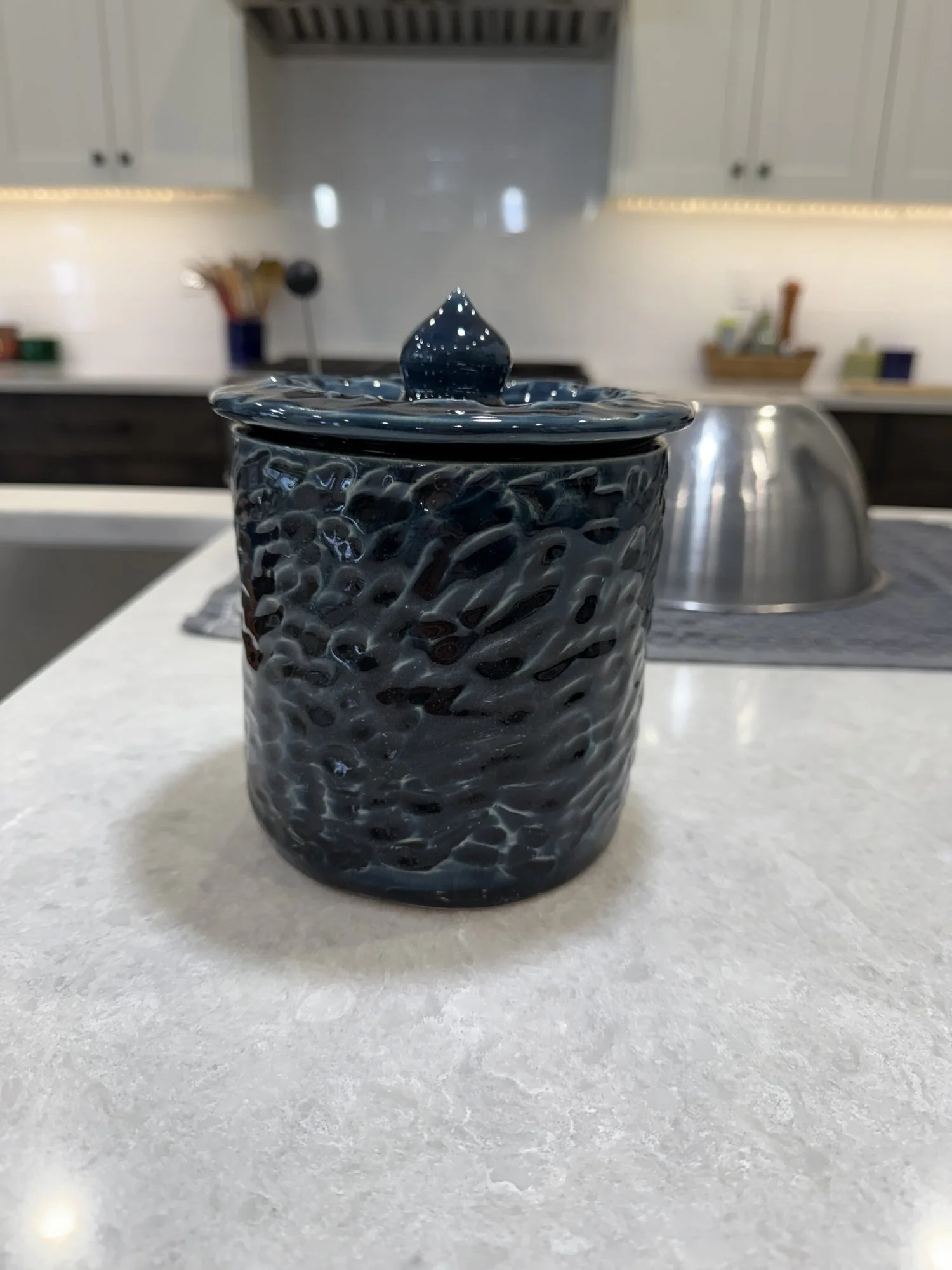 Carved black sourdough crock, 2025