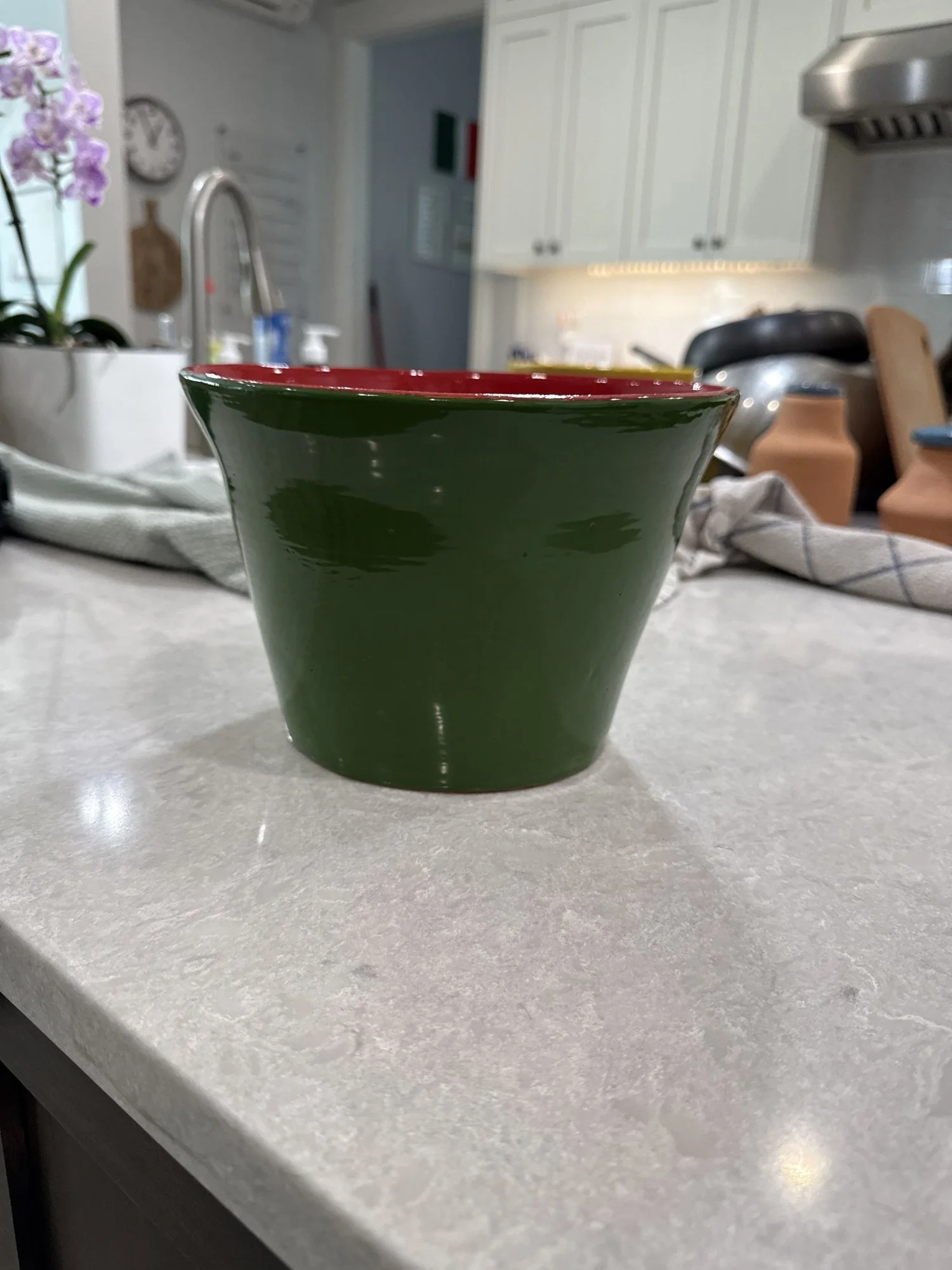 Green planter with red interior, 2025