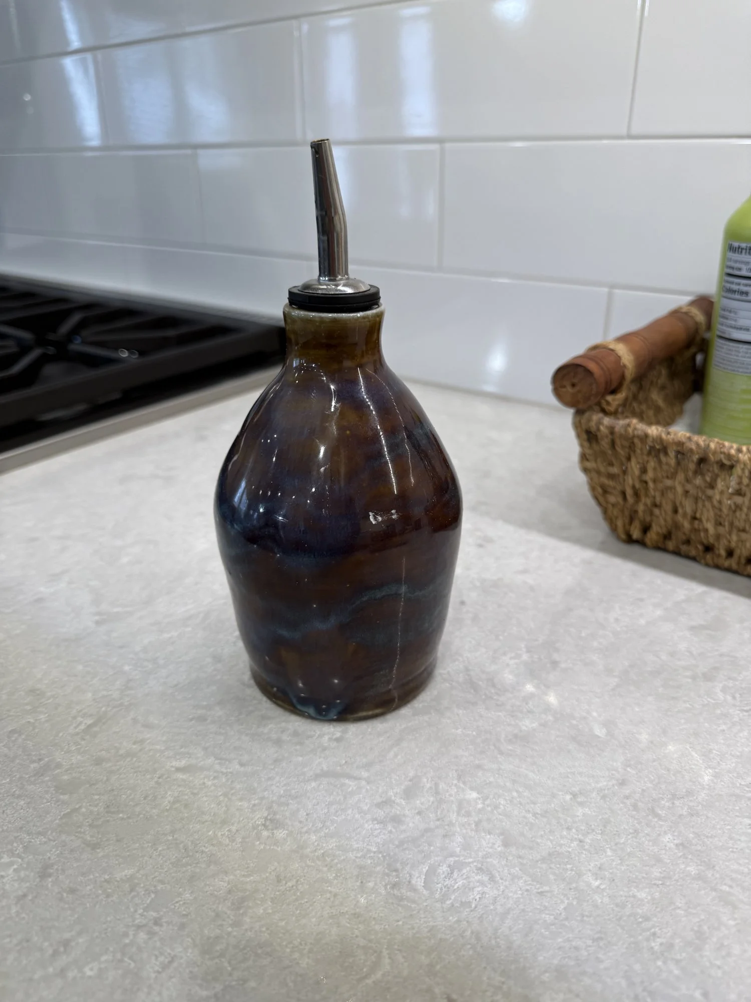 Brown and blue oil cruet, 2025