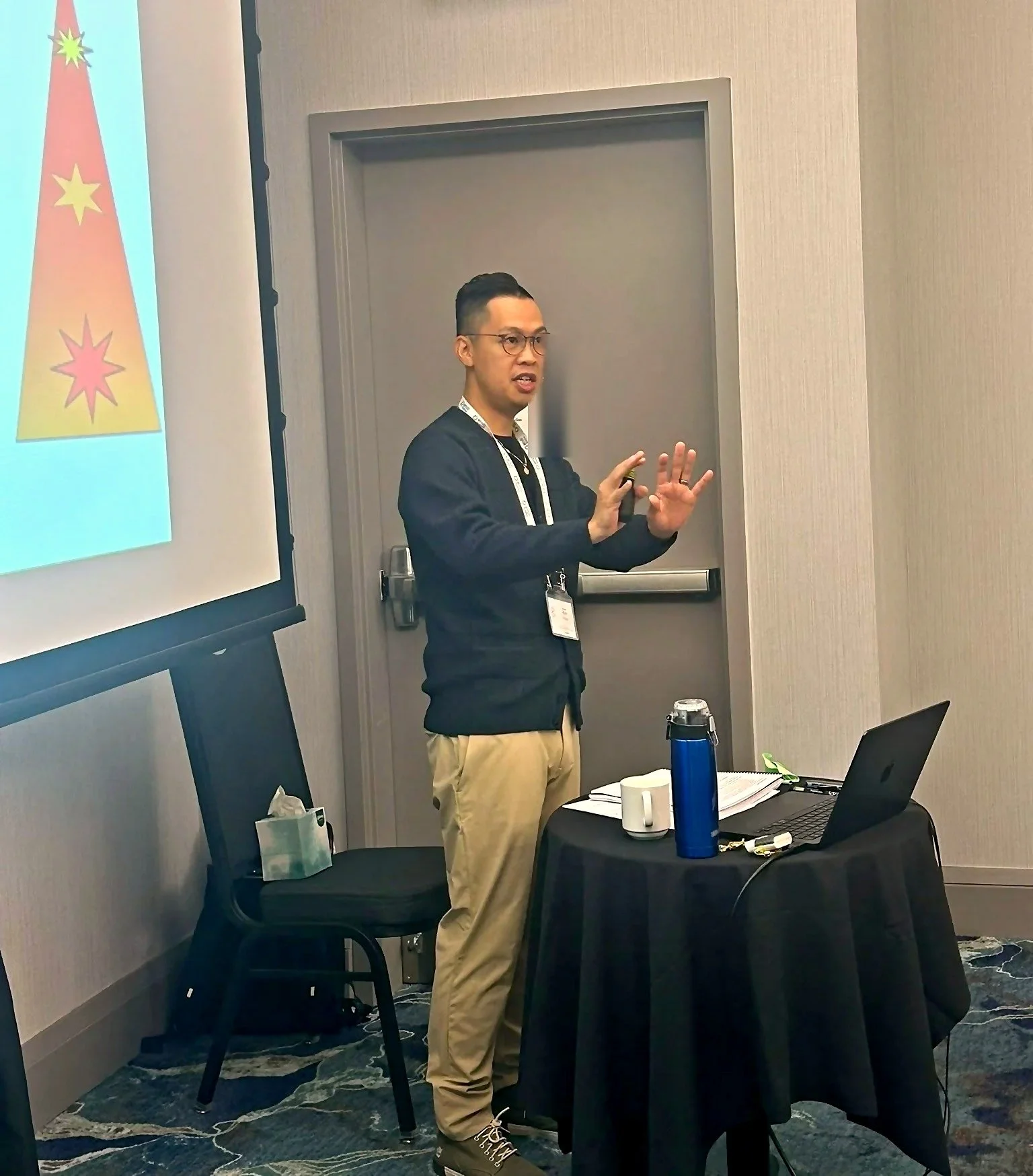 Kyle Poon presenting to clinicians at an EMDR Basic Training
