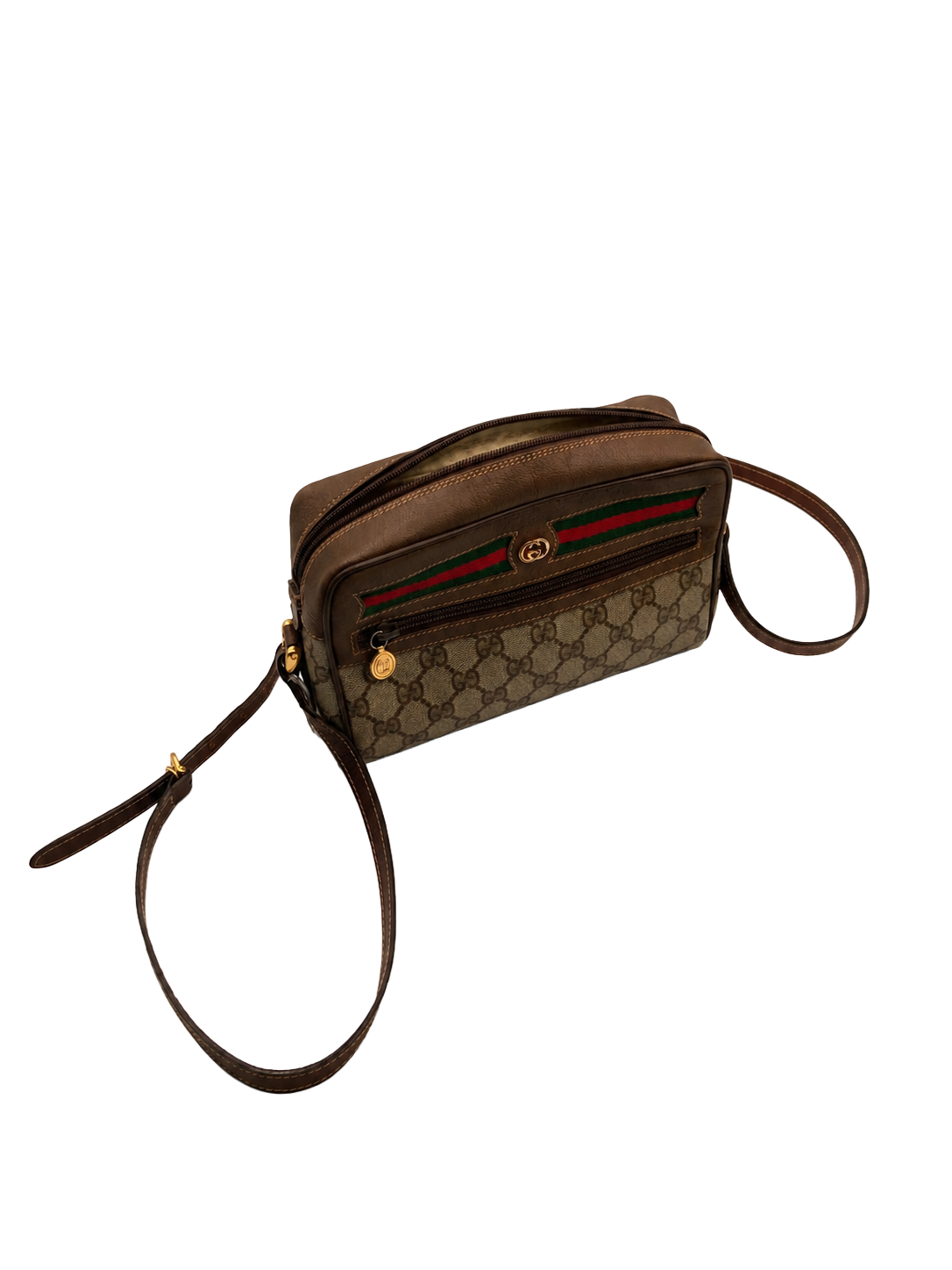 A Gucci designer shoulder bag with a monogram pattern, leather accents, a wrist strap, and front zippered pocket featuring the Gucci logo.