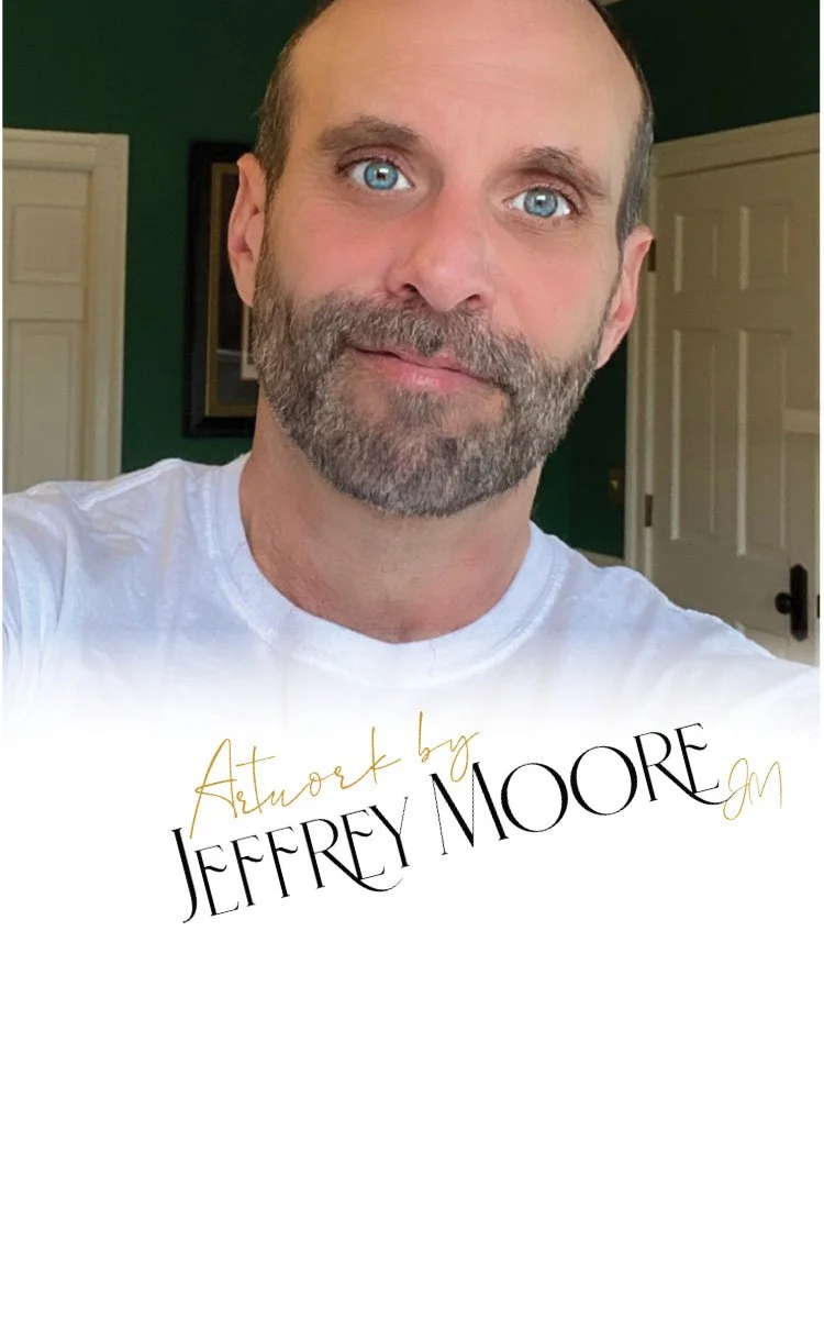 Close-up of a man with blue eyes and a trimmed beard, wearing a white t-shirt, standing indoors with white doors and a green wall in the background. Text overlay reads 'Artwork by Jeffrey Moore'.