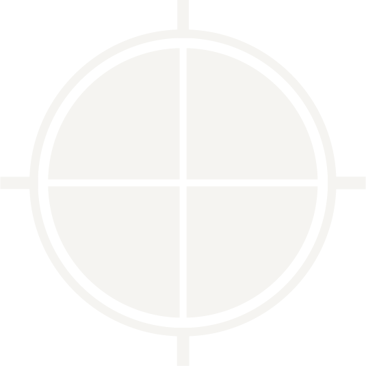 Close-up of a target or crosshair symbol with a black background.