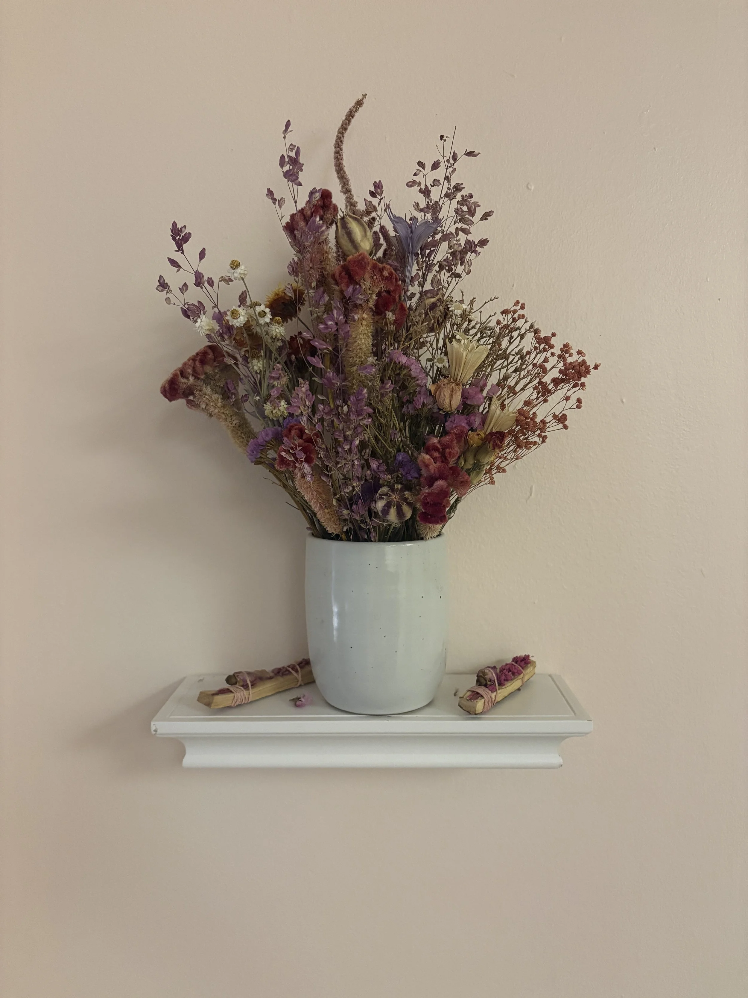 Gorgeous dry flower arrangement at entrance to therapy office in adams morgan