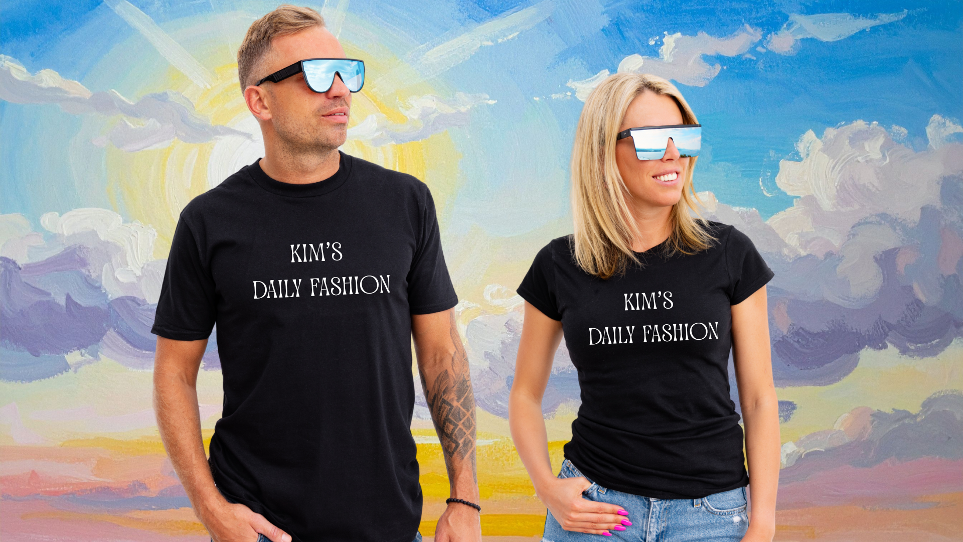 Two people wearing black t-shirts with white text, standing in front of a colorful painted sky background. The shirt says 'KIM'S DAILY FASHION.' The person on the left is a man with short hair and sunglasses, and the person on the right is a woman with long blonde hair and mirrored sunglasses.