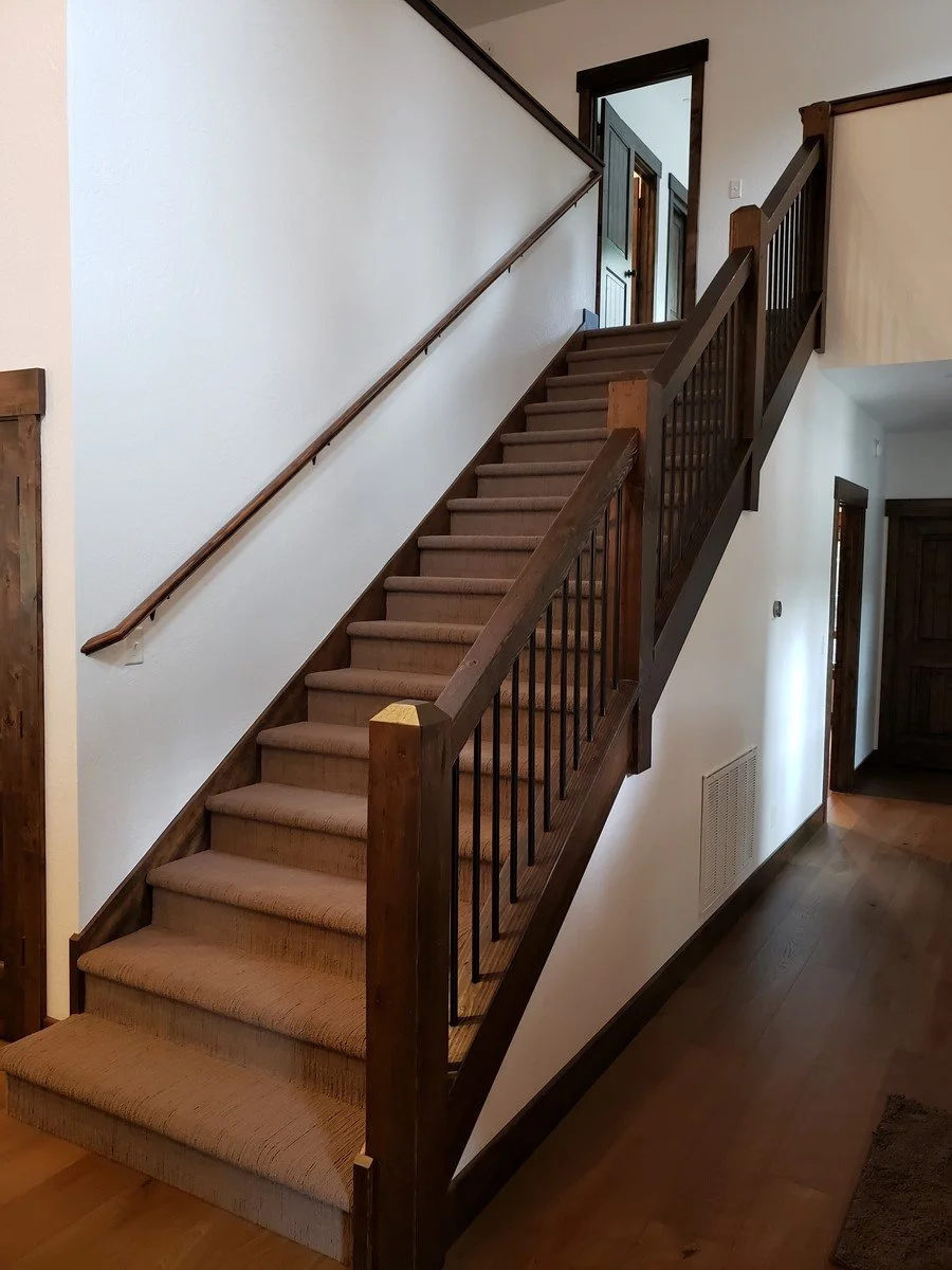 Wood staircase. We offer affordable residential design services in Idaho, including cities such as Boise, Meridian, Eagle, Kuna, McCall, Cascade, Caldwell, Melba, Middleton, Star, Horseshoe Bend, Emmett, and Marsing.