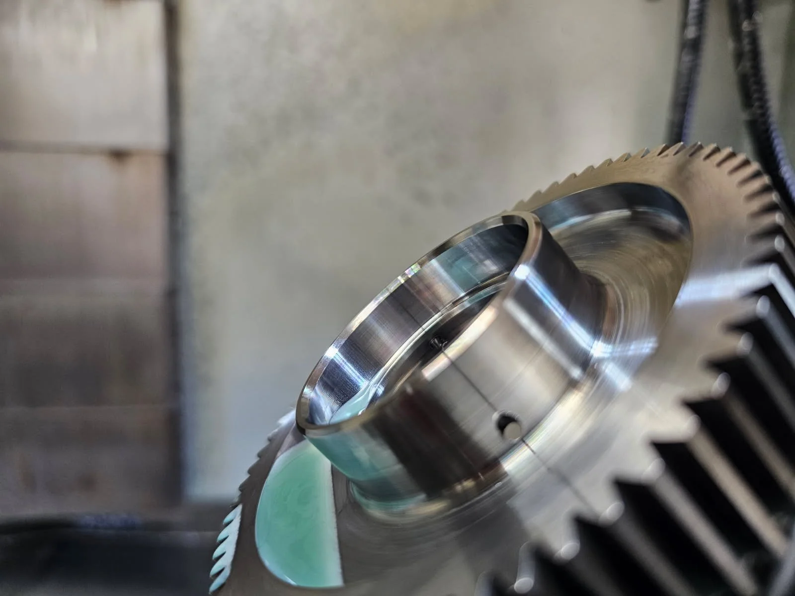 Close-up of a metal gear and bearing.