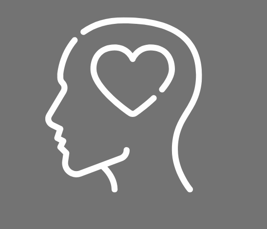 Outline of a person's head in profile with a heart inside the brain area, on a gray background, representing meditation and mindset.