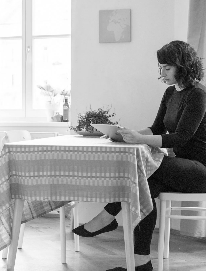 Image of Sara at desk