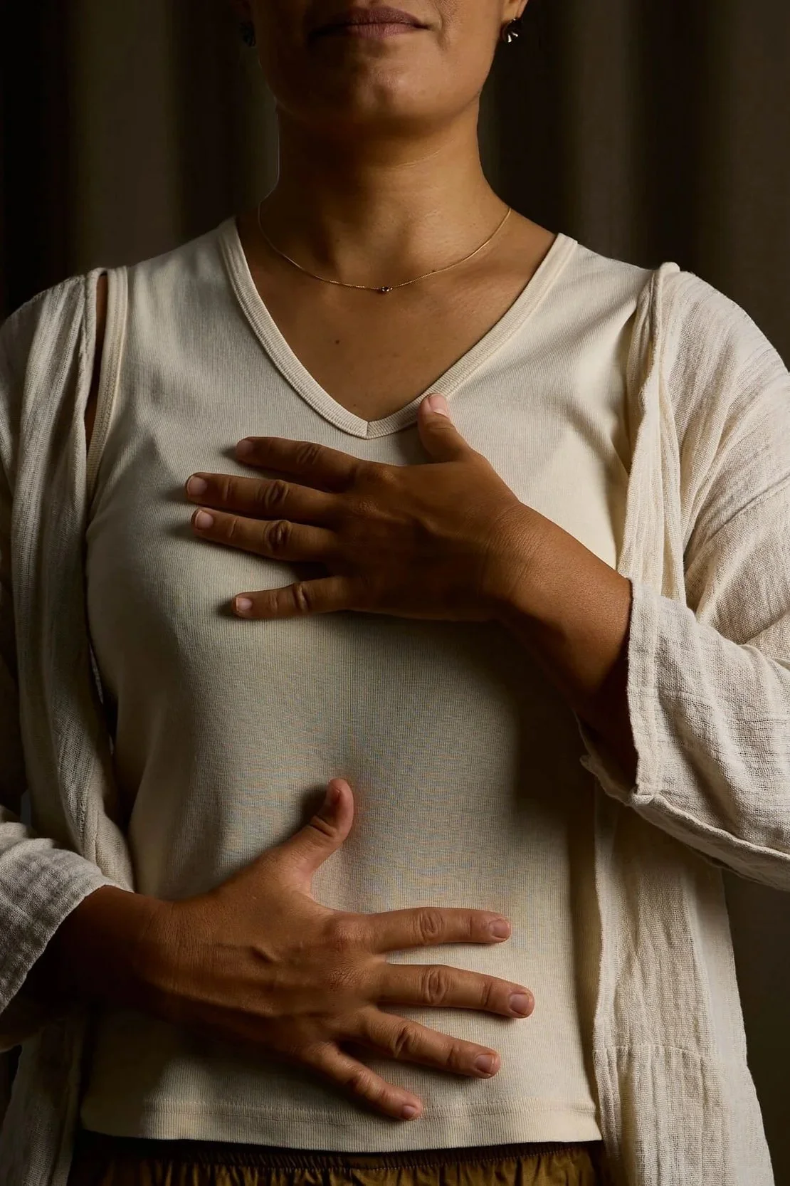 During a breathwork session in Bangkok with Khwan Breathwork, we will place our hands on our abdomen to help us feel the breath.