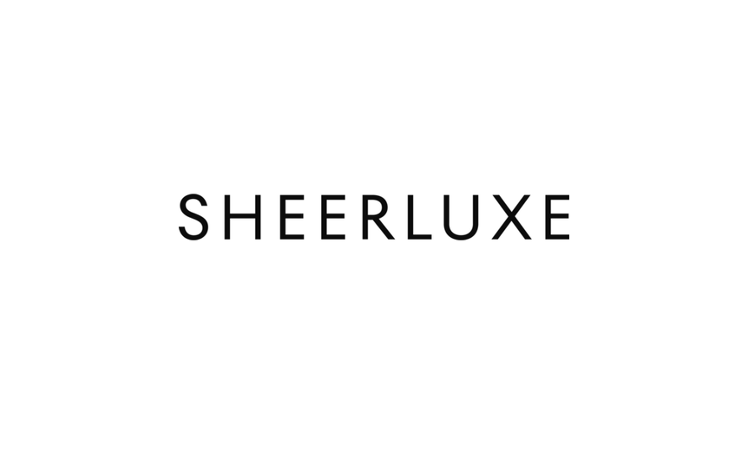 The word 'SHEERLUXE' written in black capital letters on a white background.