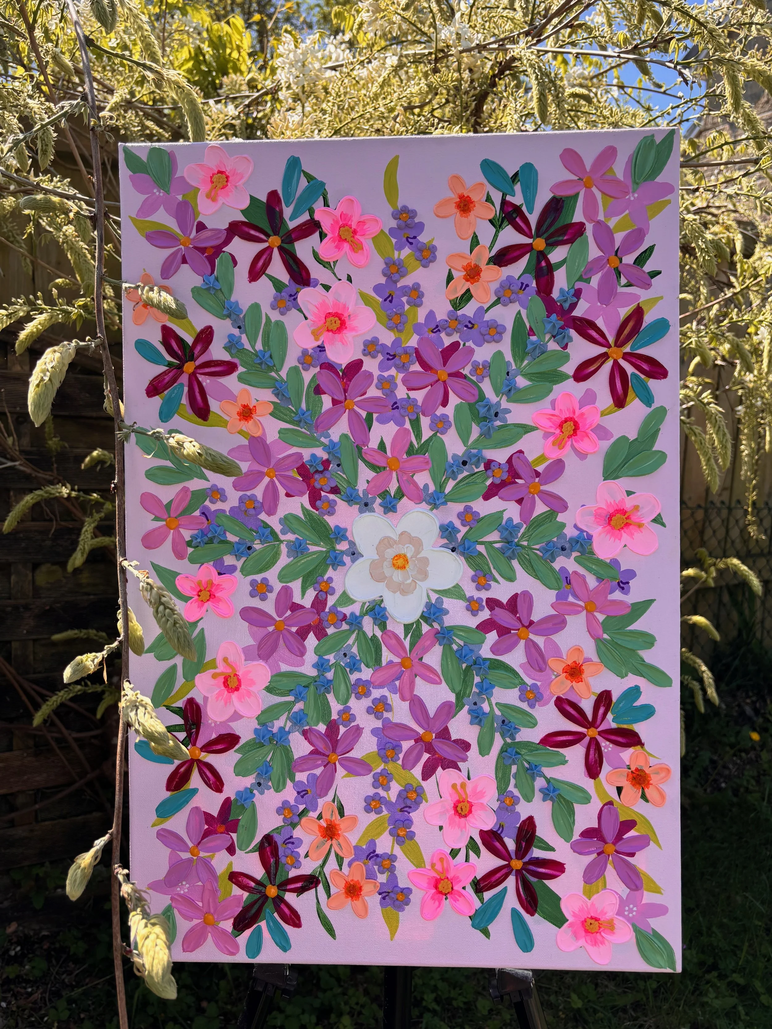 Textured floral wall art featuring vibrant blooms and 3D acrylic detail
