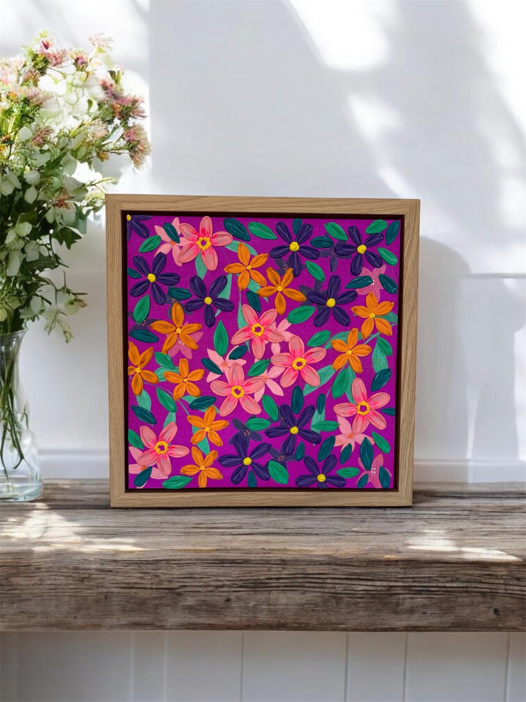 Colourful textured floral wall art with vibrant blooms