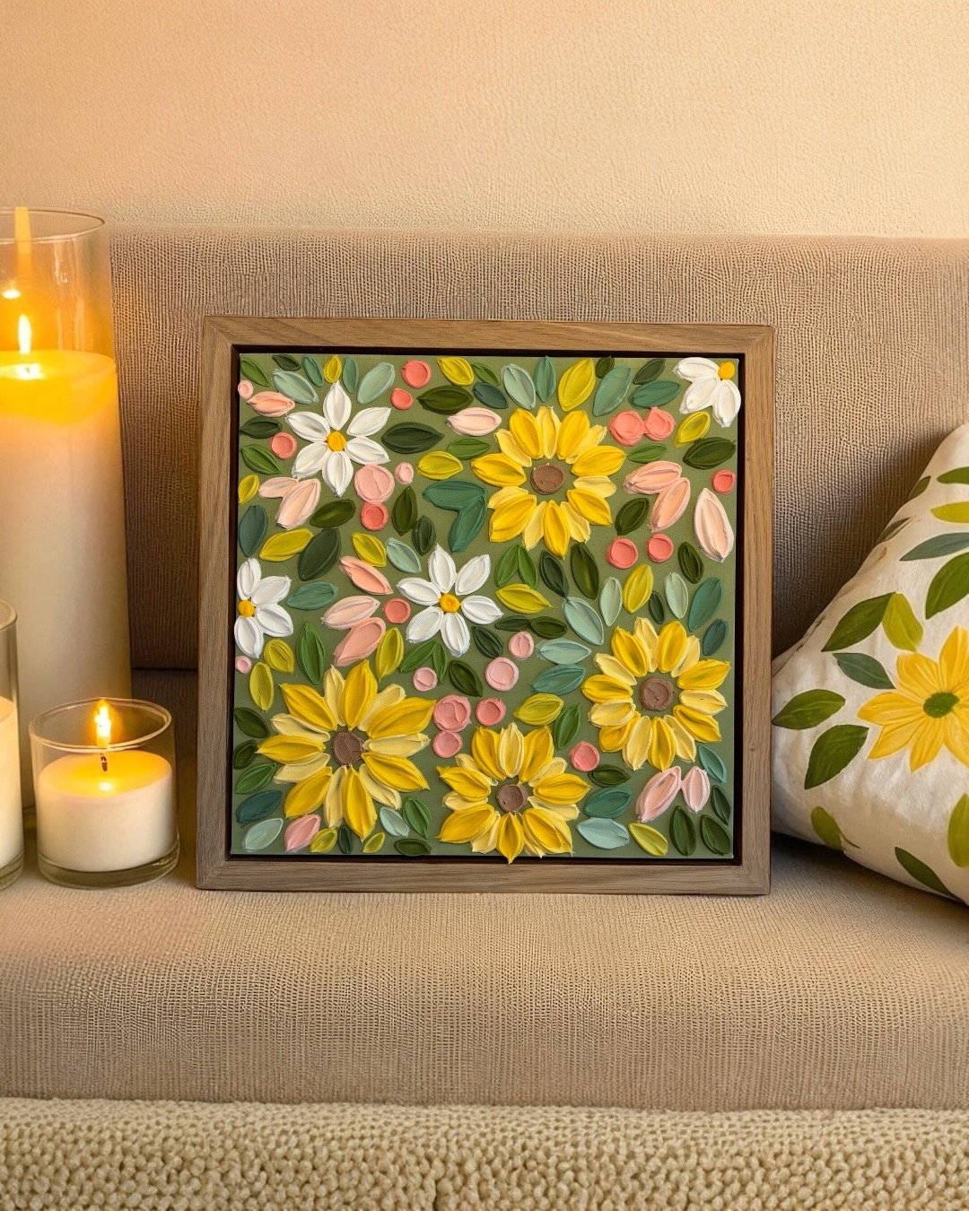 Textured floral wall art featuring large yellow sunflowers on olive green background
