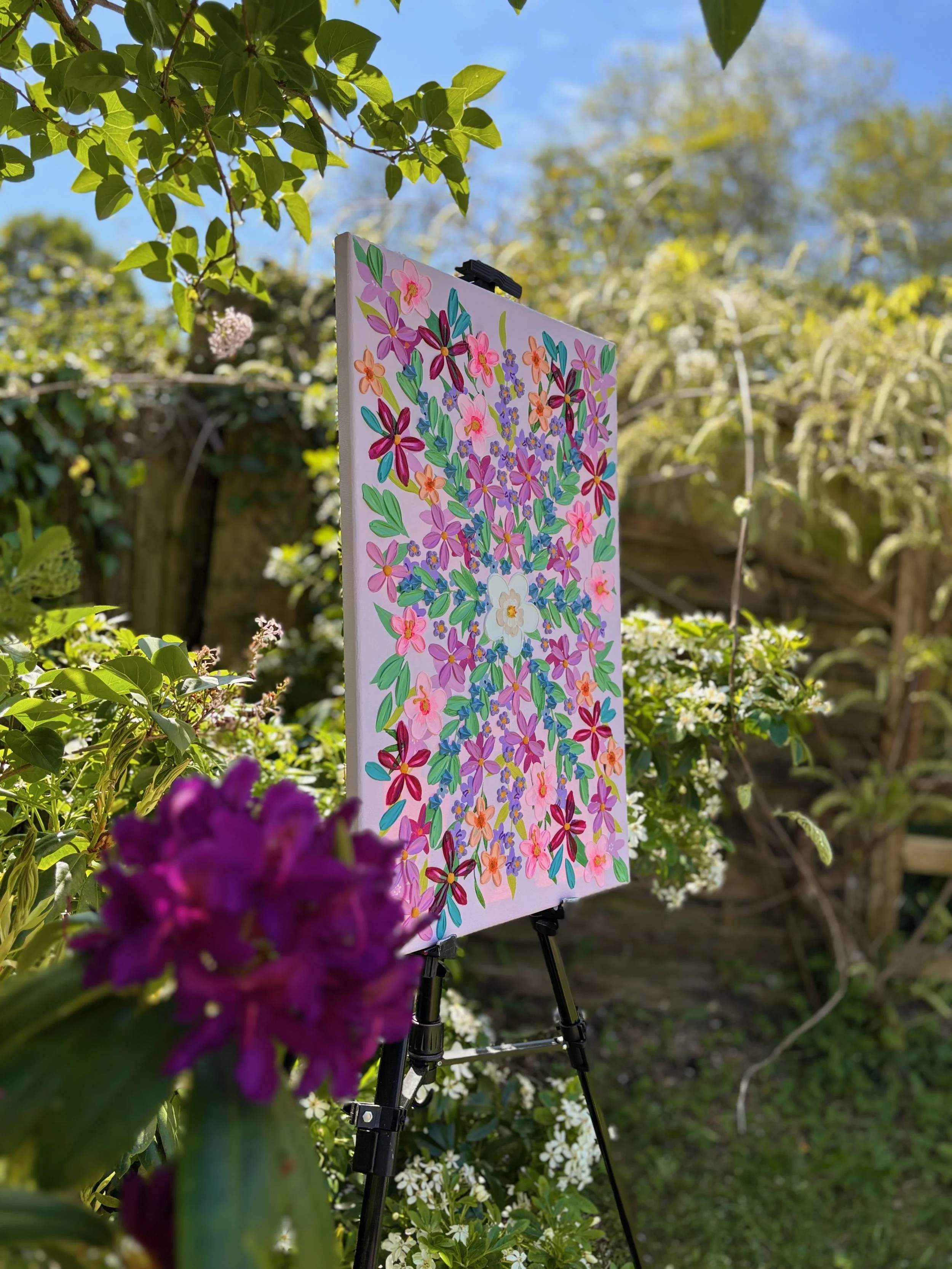 Textured floral wall art featuring vibrant blooms and 3D acrylic detail