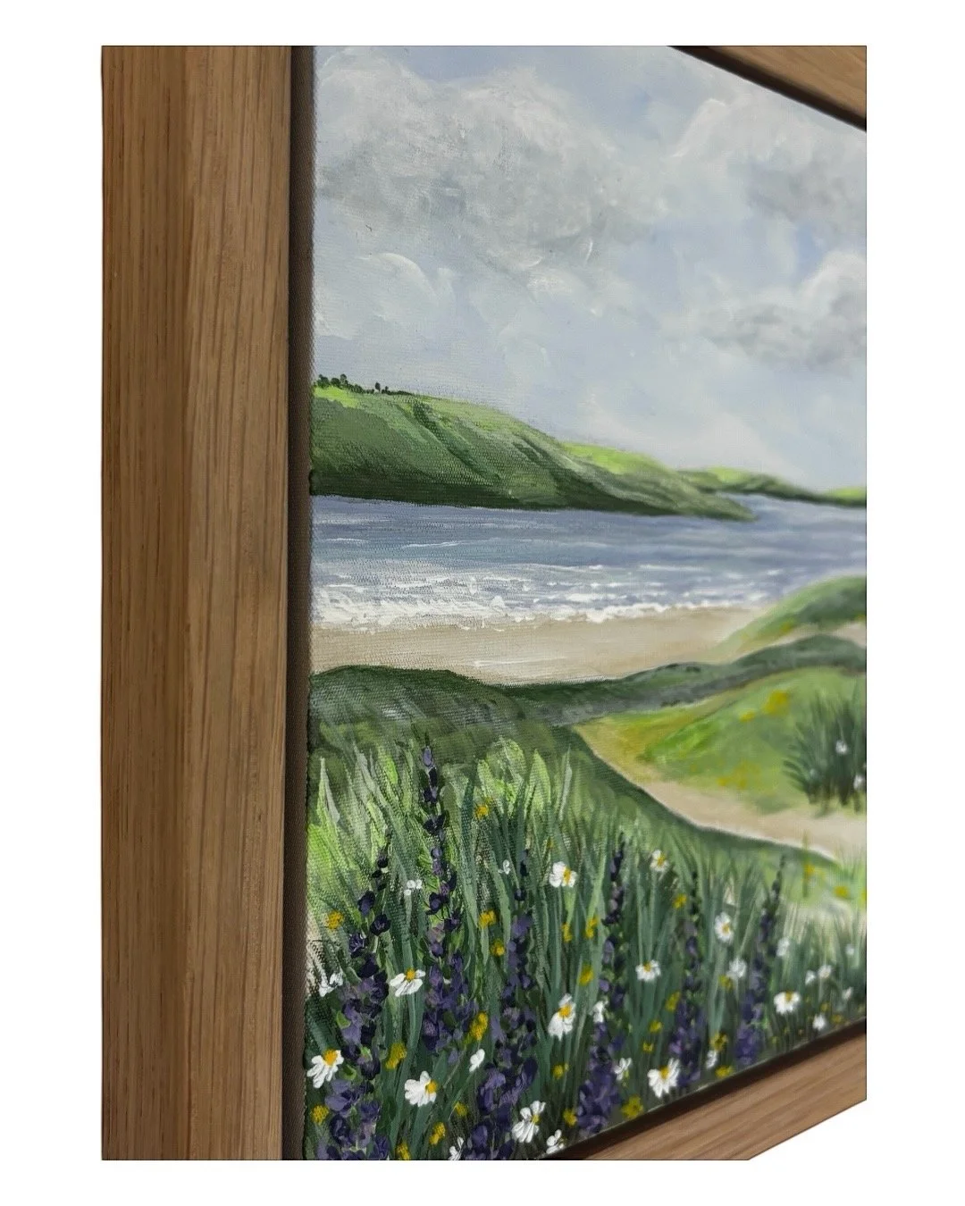 Rock to Tregirls original Cornwall coastal painting featuring green fields and calm estuary waters in oak veneer frame
