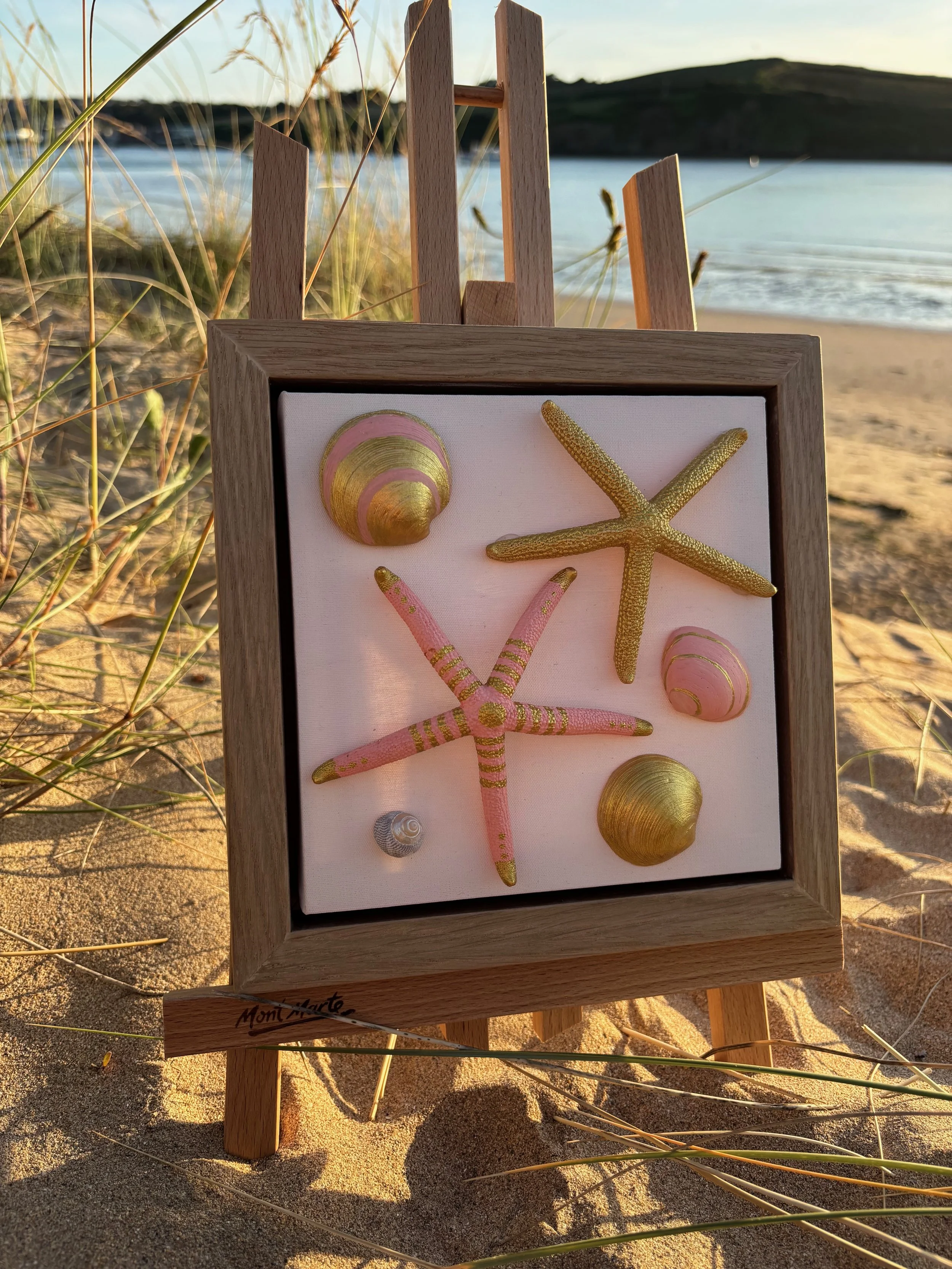 Small pink and gold shell wall art with hand painted starfish