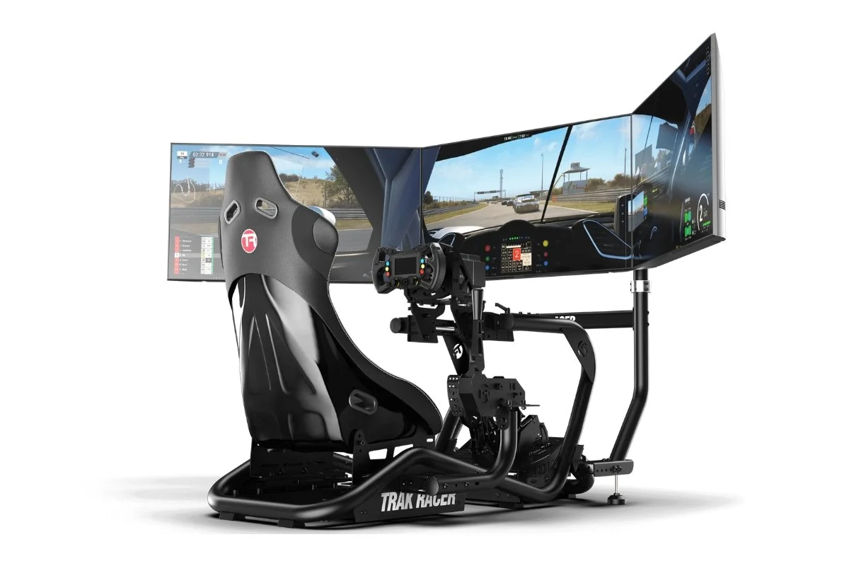 Full motion sim racing cockpit setup with multi-screen display