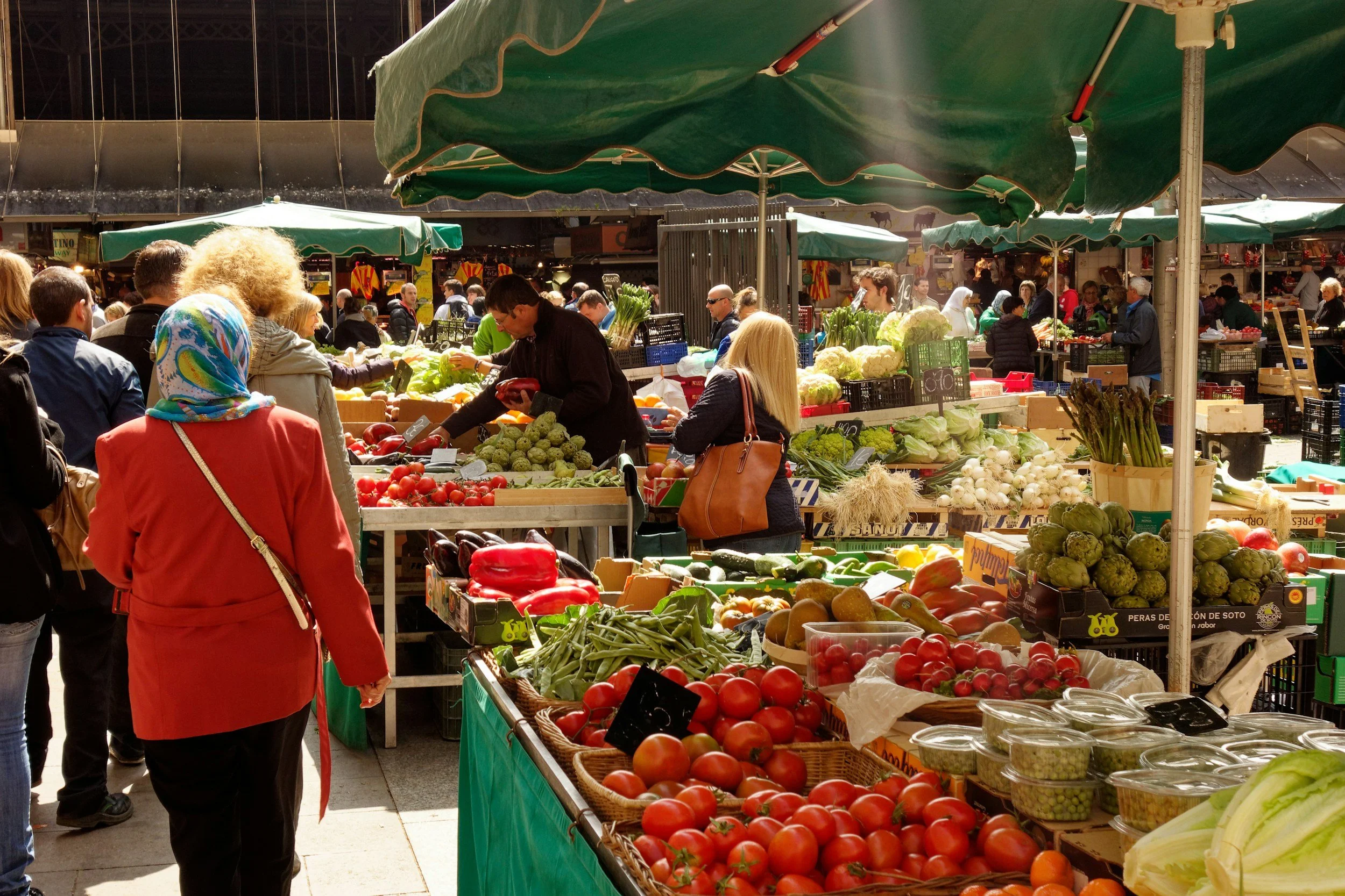 Local food market in Costa Blanca with fresh Mediterranean vegetables and seasonal produce.