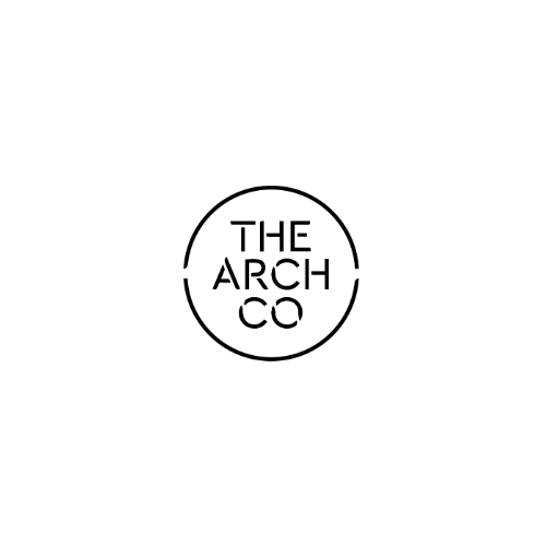 A minimalist logo with the text 'The Arch Co' inside a black circle with a small gap in the circle.