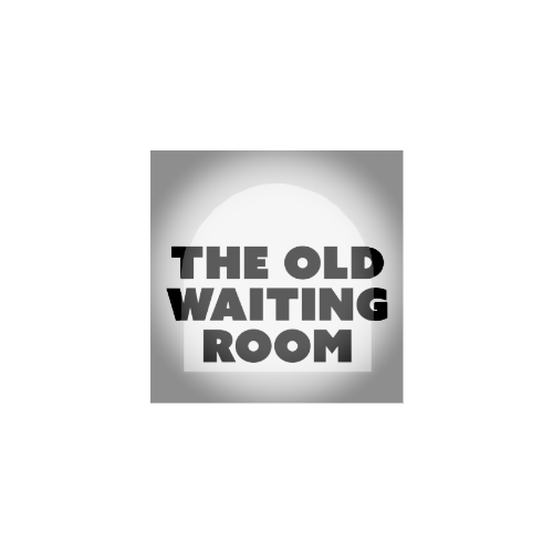 Sign reading "The Old Waiting Room" with a spotlight effect