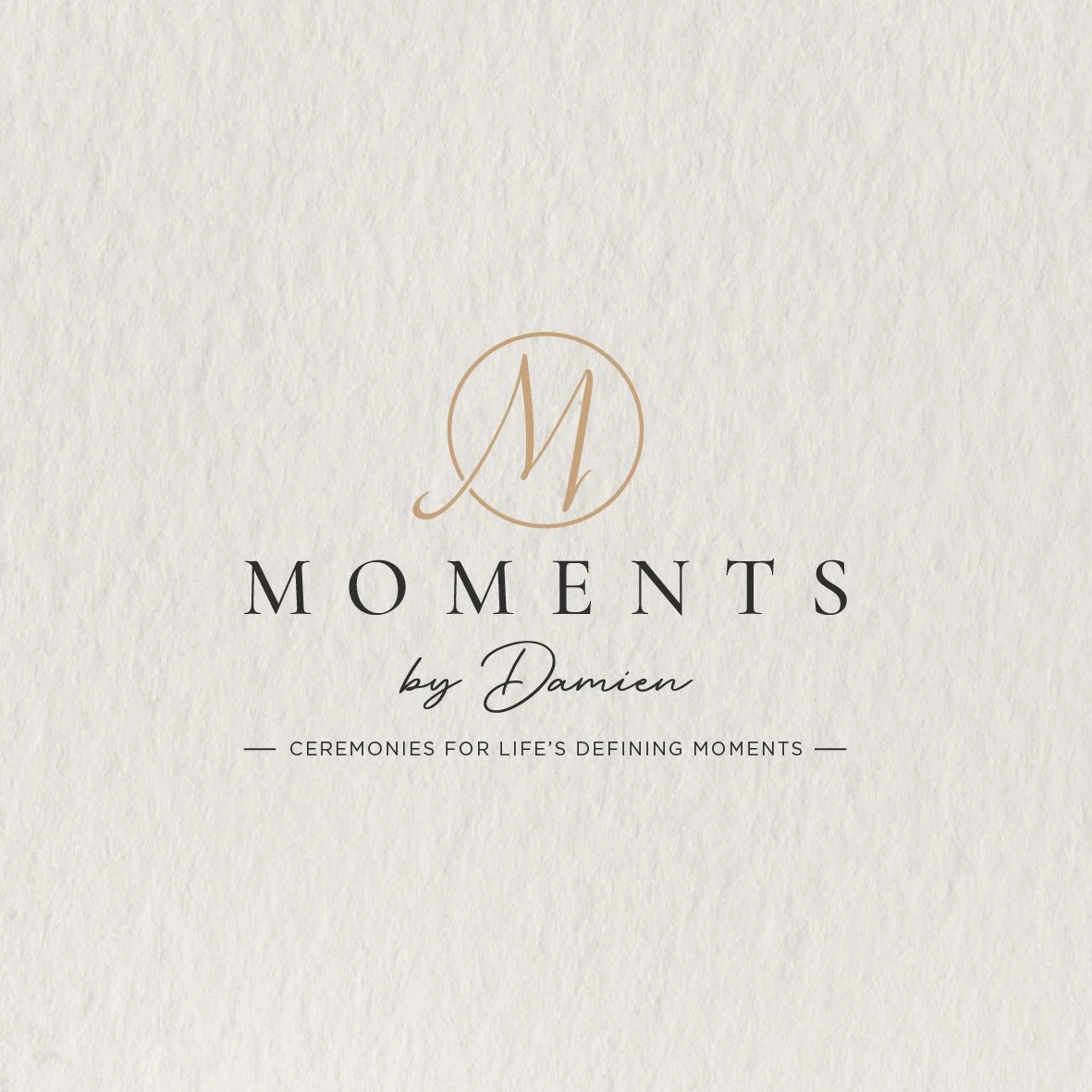 Logo for Moments by Damien, a company offering ceremonies for life's defining moments, with elegant text and a monogram 'M' inside a circle on a textured, light-colored background.