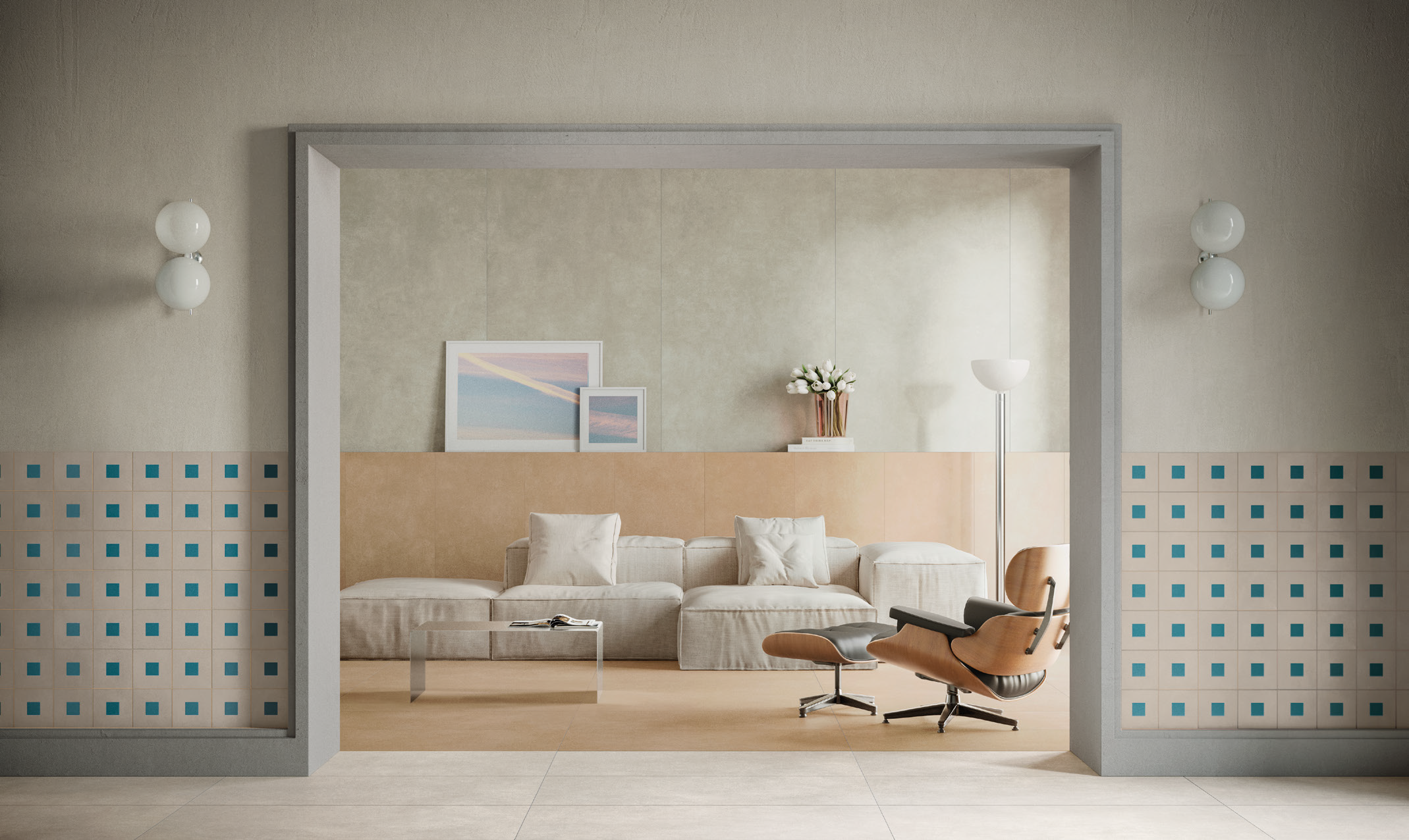Living room with beige walls, a white sofa, a black coffee table, framed artwork, a vase of white flowers, and an orange lounge chair with a matching ottoman.