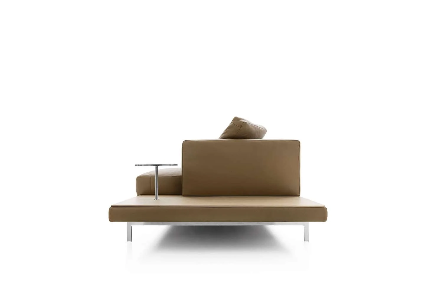 Modern tan leather sofa with a side table on a white background.
