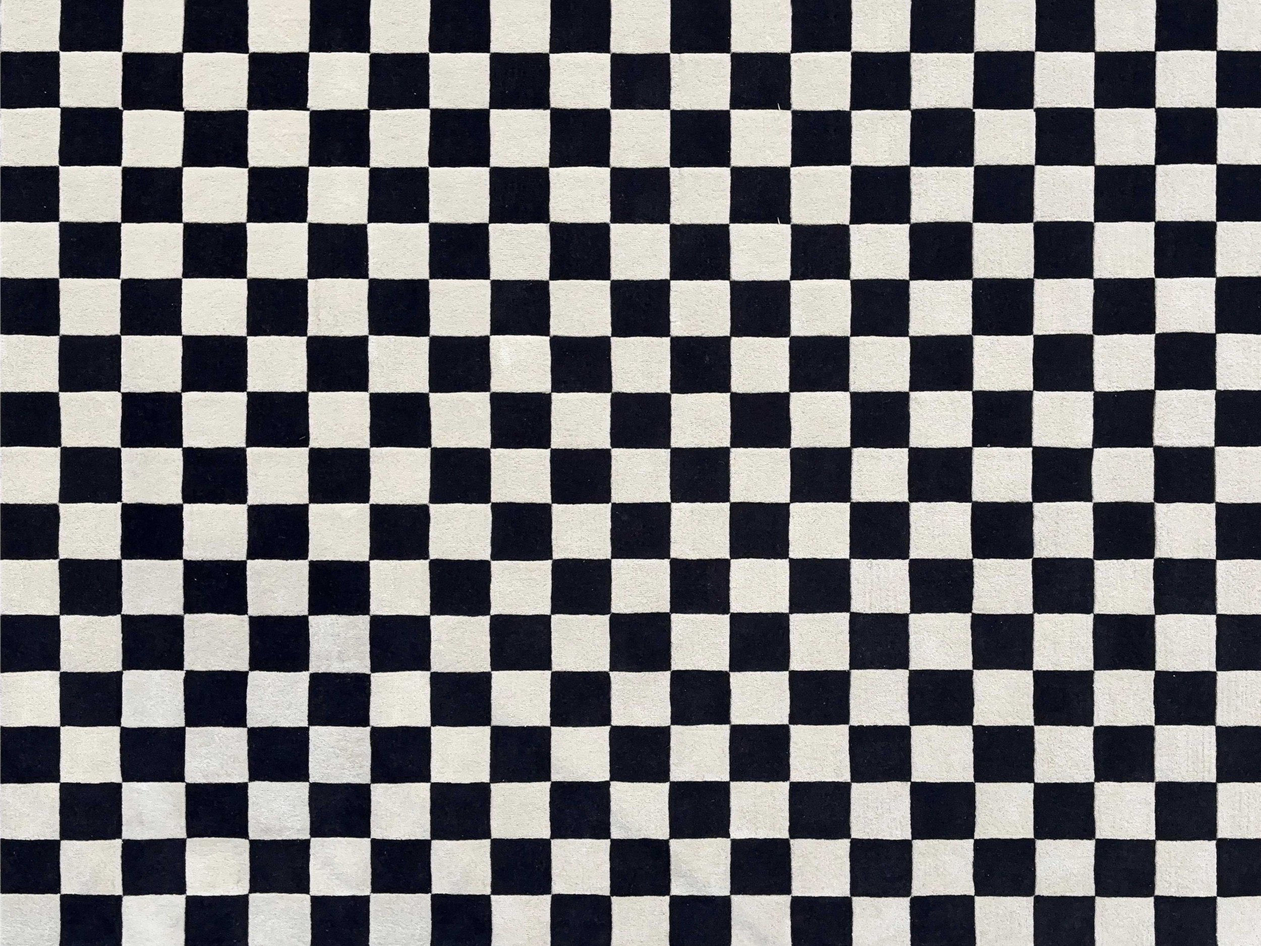 A black and white checkered pattern with small squares