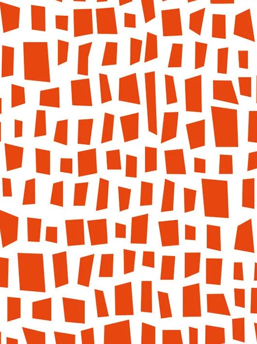 Abstract pattern of irregular red shapes on a white background.