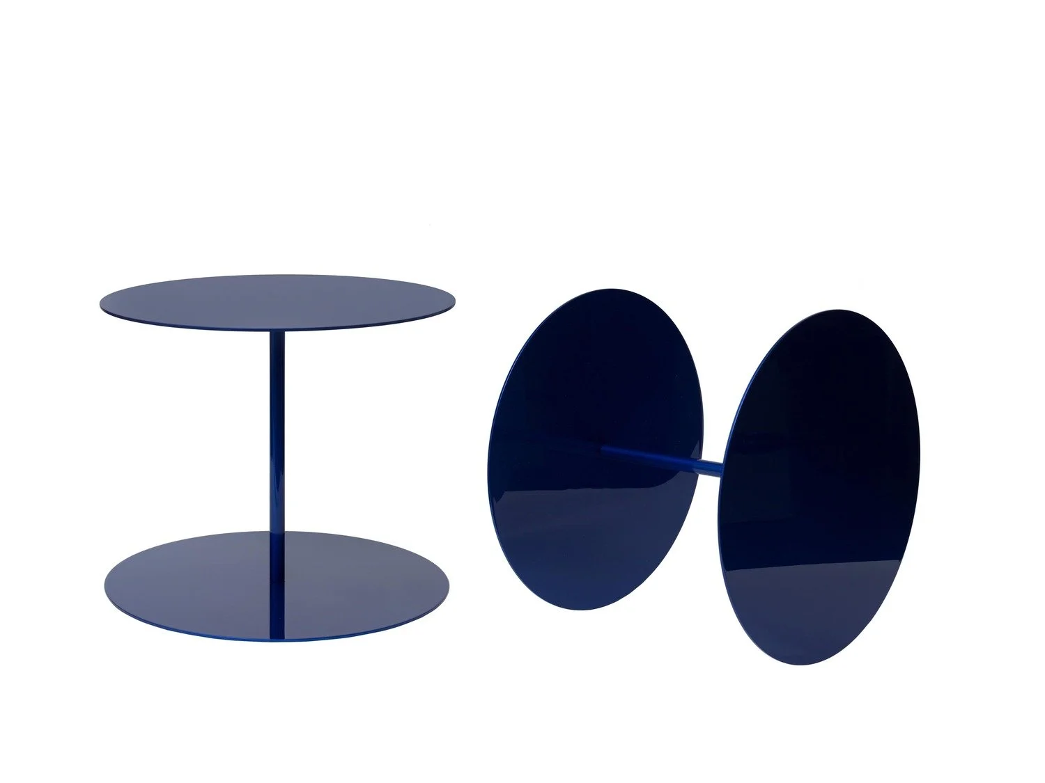Modern blue side tables with one standing upright and the other flipped on its side on a white background.