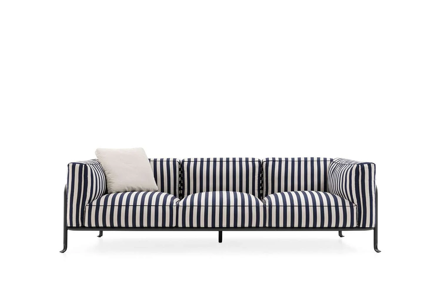 A stylish sofa with navy and white vertical stripes, accompanied by a white pillow, set against a white background.