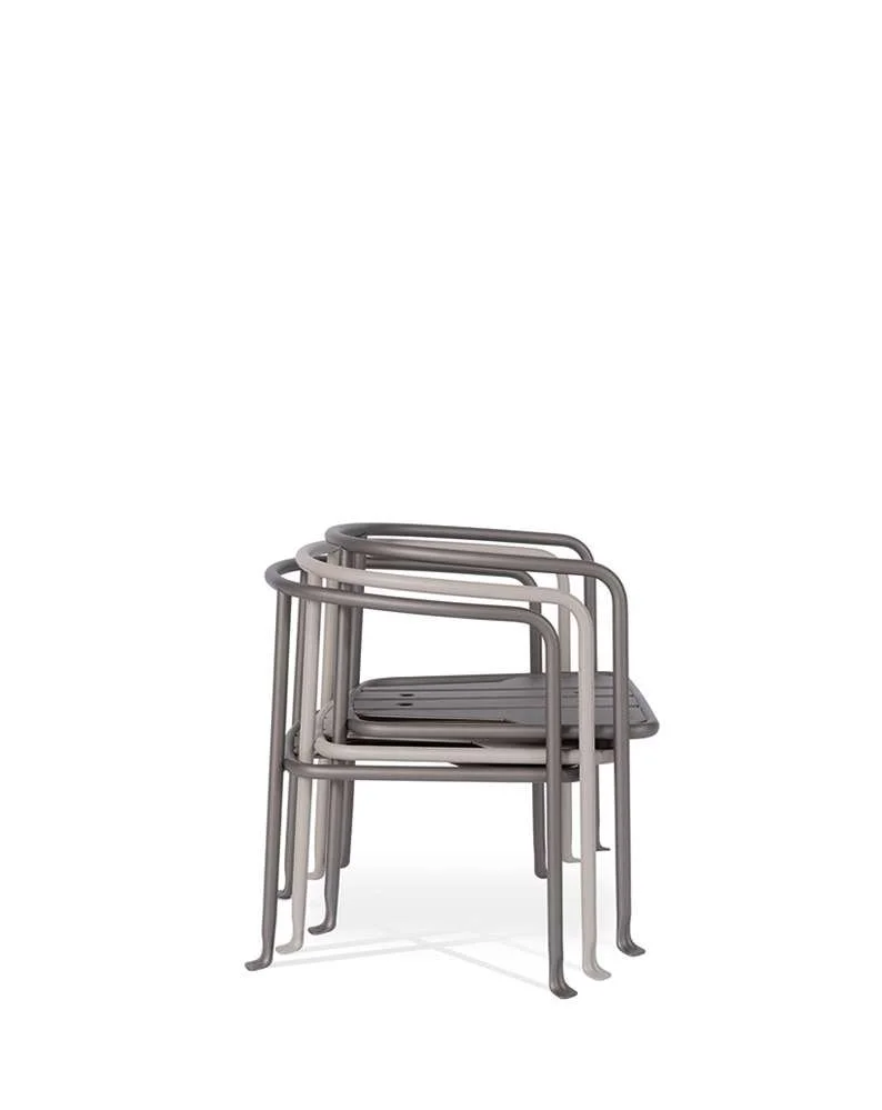 Stacked metal chairs with padded seats on a white background.