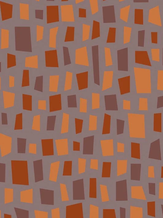 A pattern of irregular, multicolored geometric shapes in shades of orange and brown on a gray background.