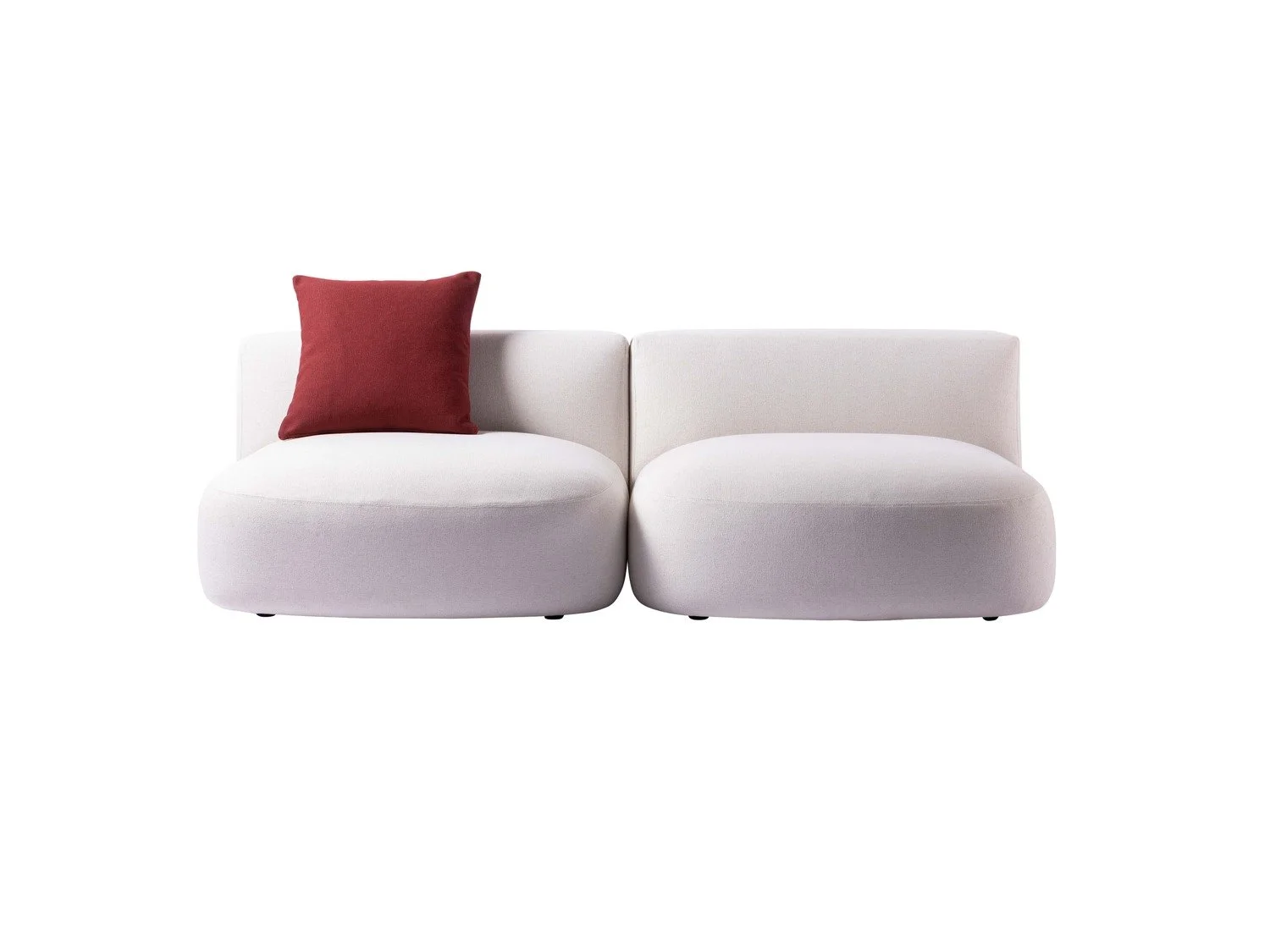 White sectional sofa with a red pillow on the left side, against a plain white background