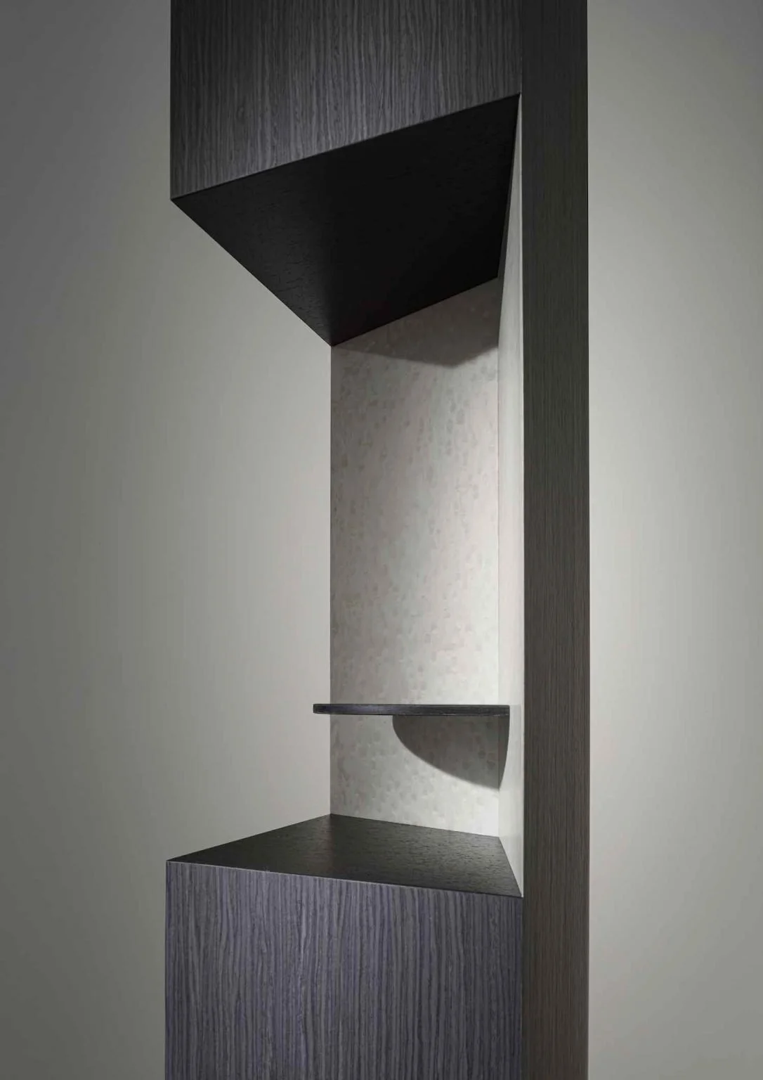 Modern wall-mounted shelf unit with dark wood borders, a beige back panel, and a small semi-circular shelf in the middle.