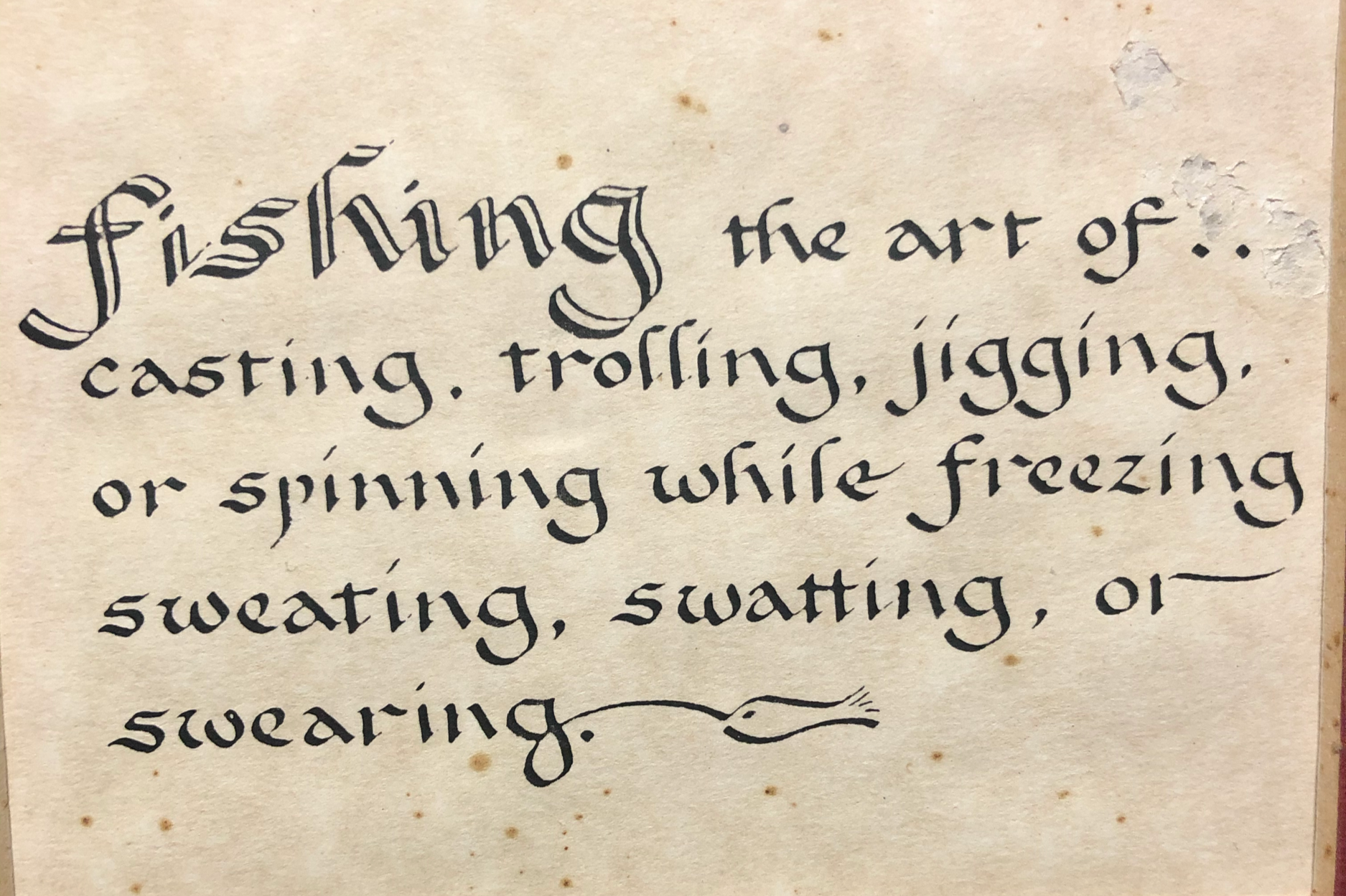 Close-up of a paragraph of handwritten calligraphy on aged paper, with the visible words 'fishing the art of...'. sandbar Captain Tilly OC Fishing Charters. Ocean City, MD