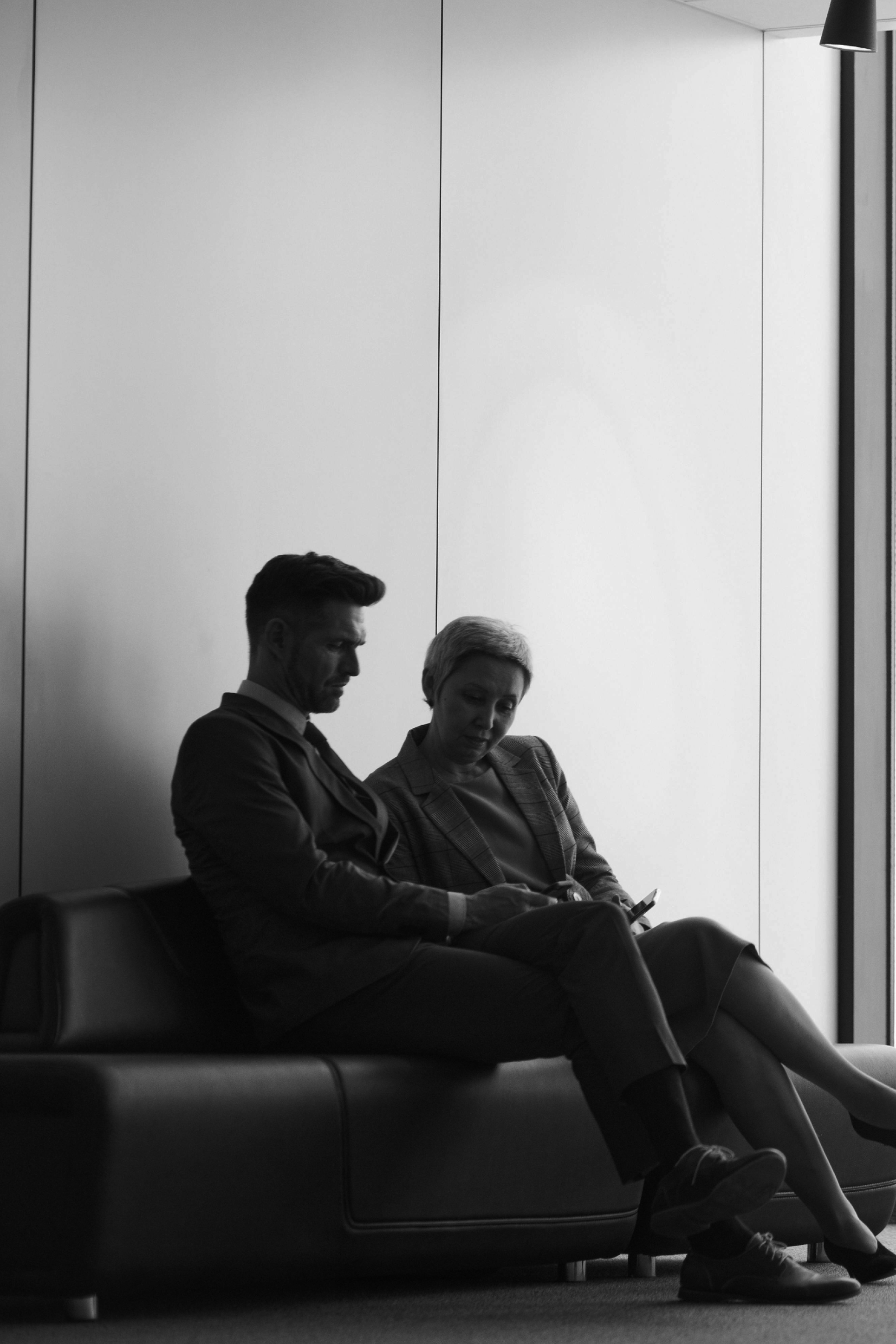 Man and woman in an office collaborating
