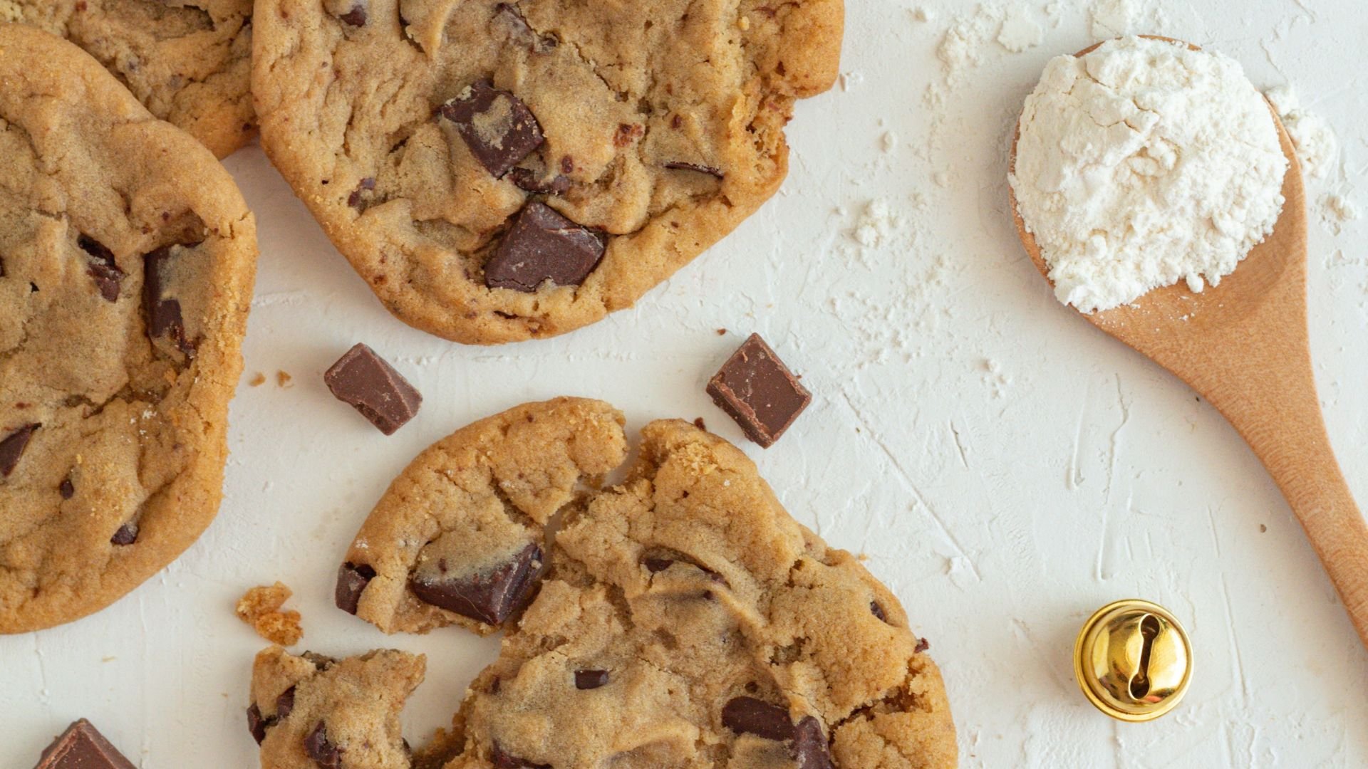 Fresh chocolate chip cookies on a baking surface representing the Causeways Palette Cookies Policy.